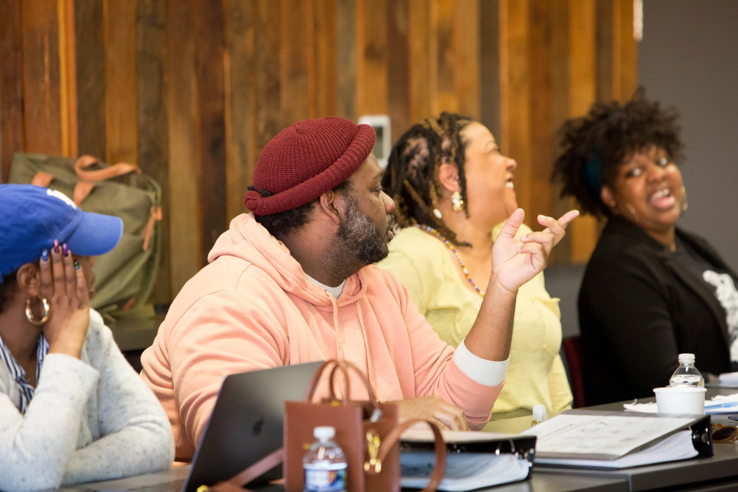 Participants engage and laugh during a JWC Foundation recurring programming session
