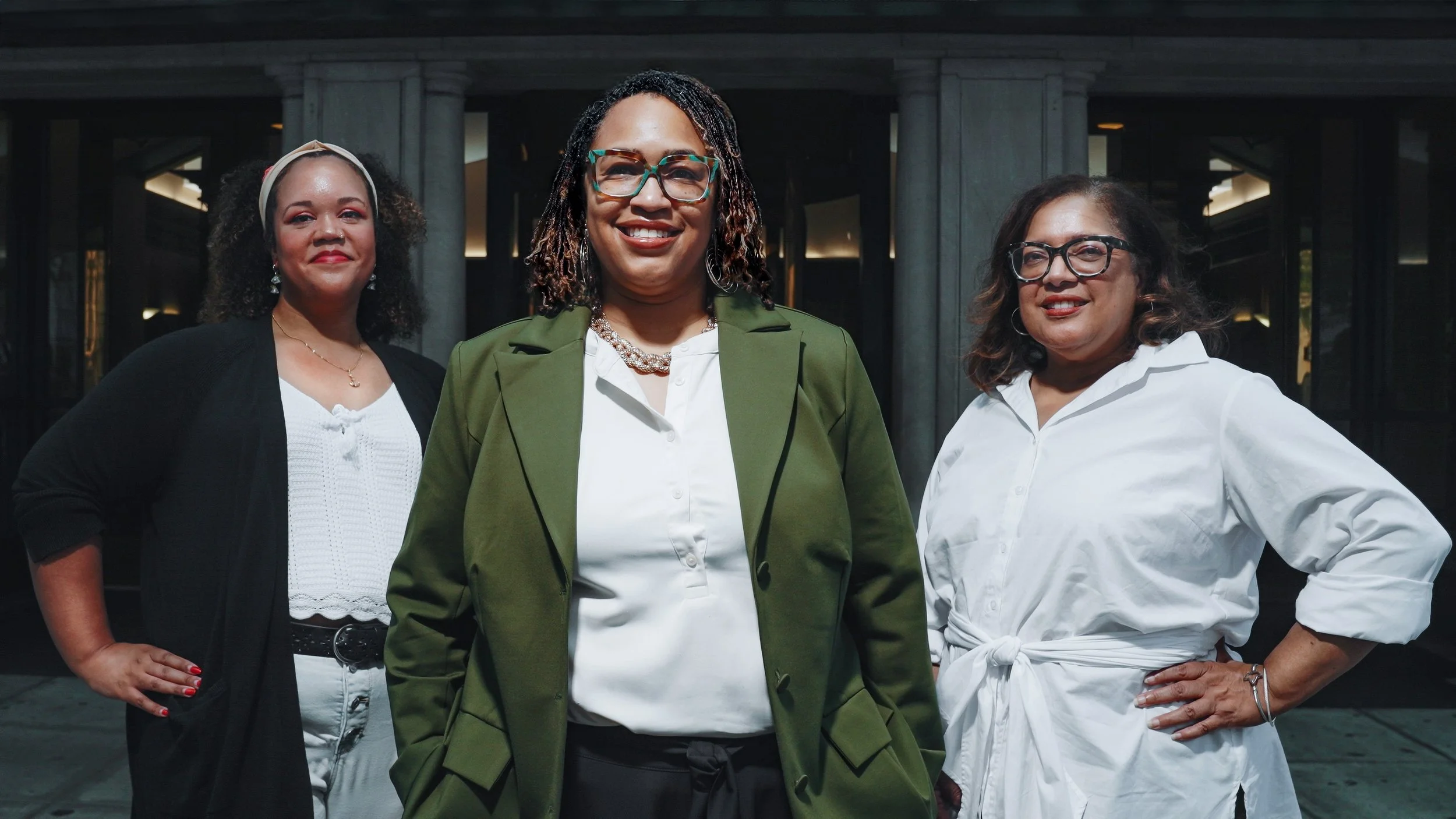 The BLCK Street team standing together outside a columned building, left to right: Olivia Ames, Rasheeda N. Creighton, and Lisa F. Townes