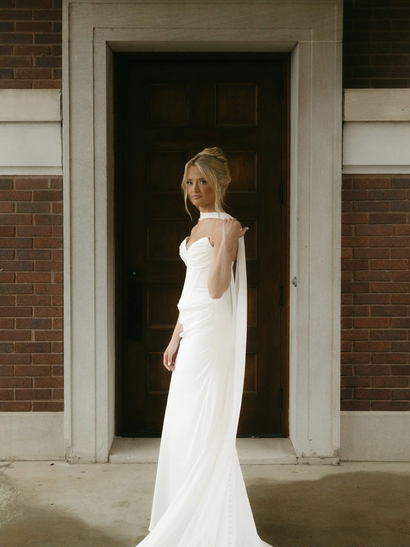 Gabby is effortlessly elegant in this flowy dream&mdash;complete with delicate ruching, boning, and that statement neck scarf we can&rsquo;t stop swooning over. A vision from every angle.

ML Bride: @gabbypackjelks