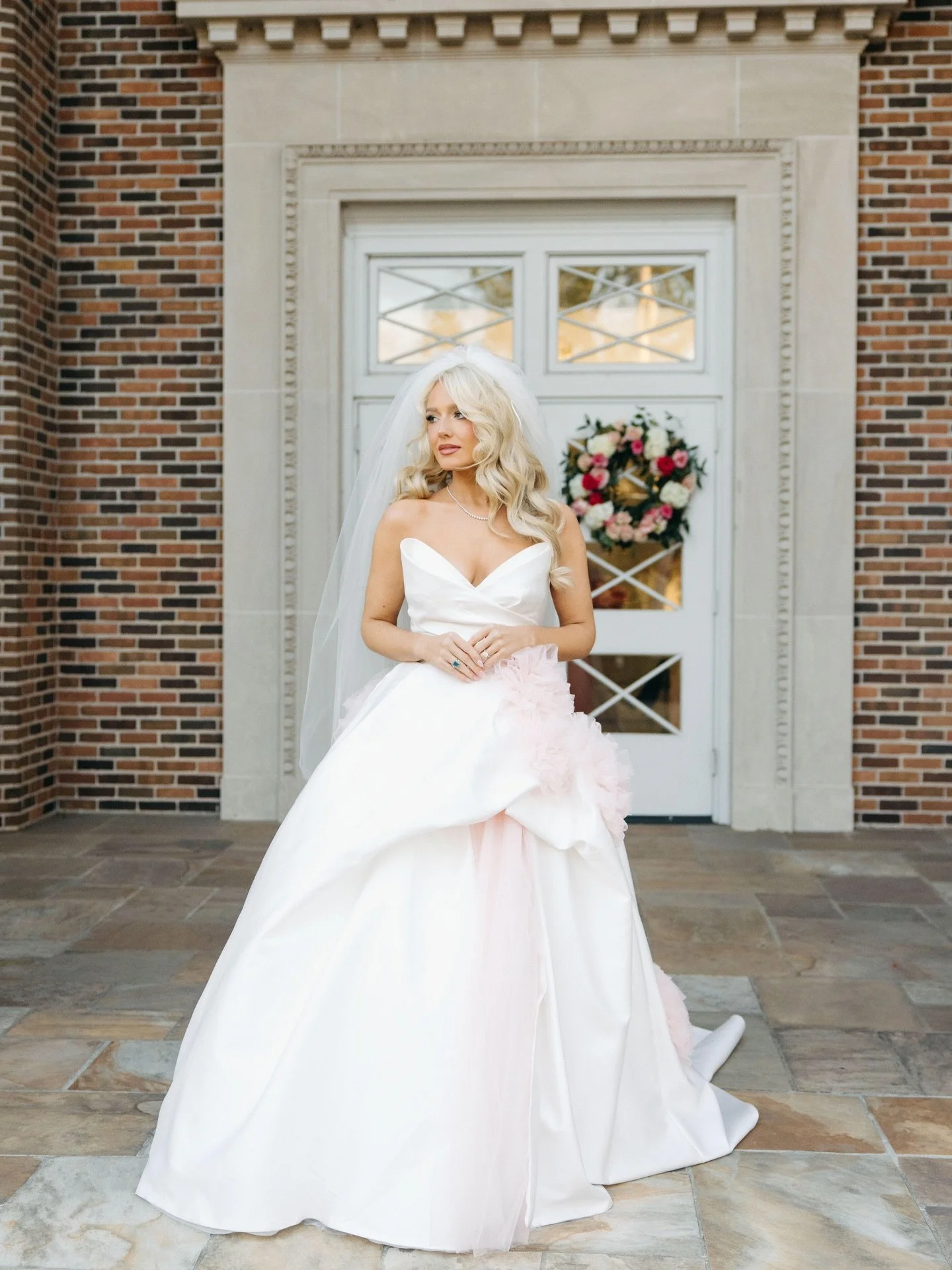 Our PINK bride!!!! 

@emmacates_ wore a stunning Monique Lhuillier gown with custom textured rosettes made from blush tulle. Emma had her girls in matching pink gowns, pink florals and cake, and even a custom pink jacket for her husband, Preston! You