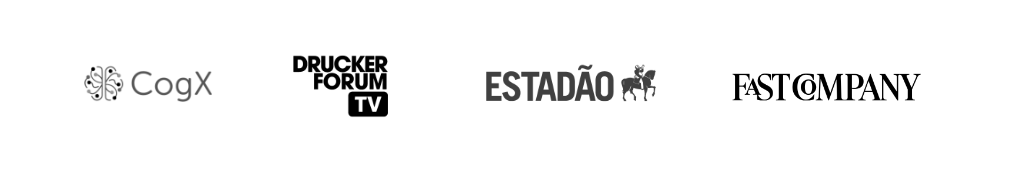 Logos of CogX and Estádio with a butterfly icon between them.