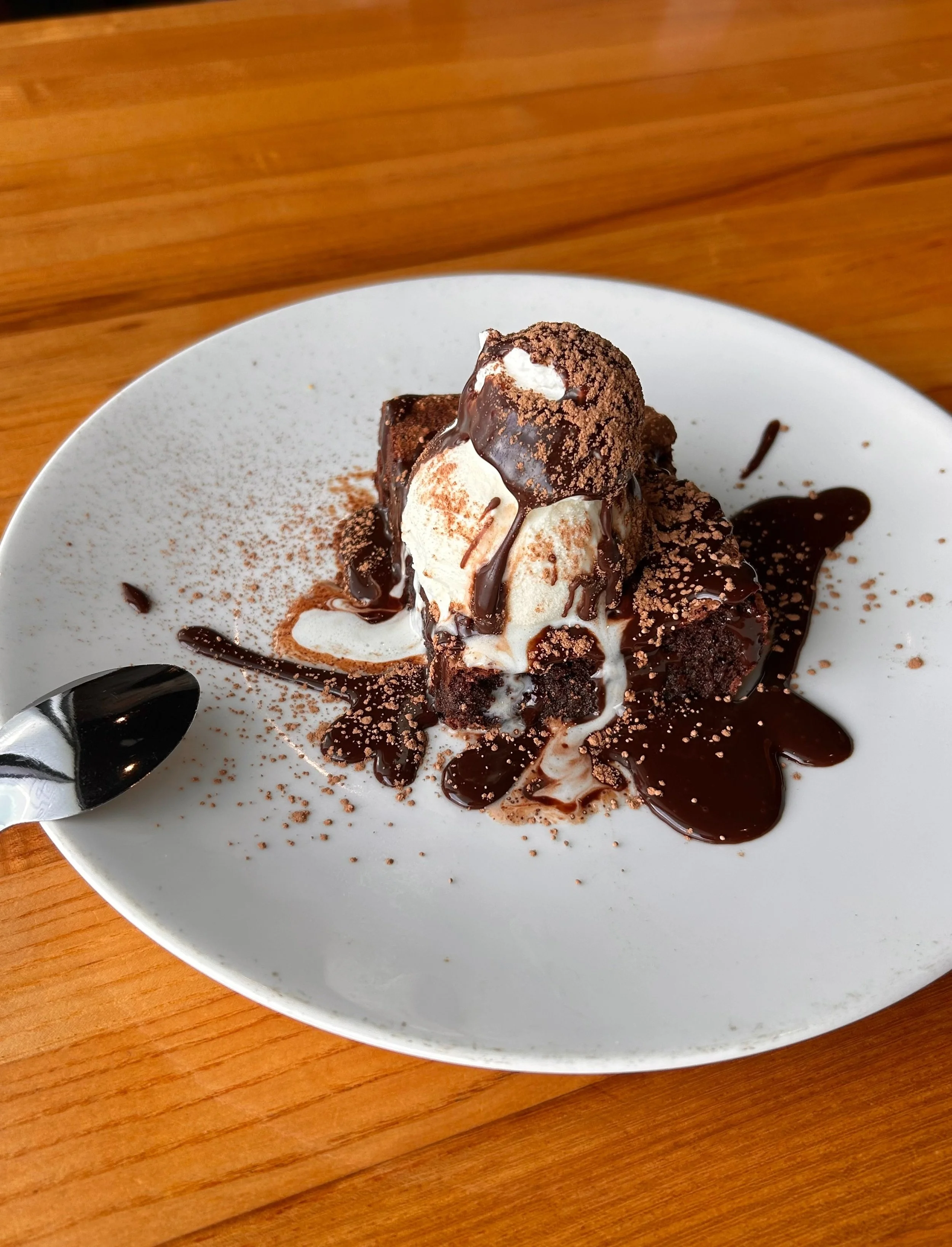 Our most popular dessert for a reason. 🍫

A flourless Ghirardelli brownie topped with vanilla bean gelato, whipped cream, and finished with a warm chocolate ganache. Completely house made, completely worth it. 
&bull;
&bull;
&bull;
&bull;
&bull;
#Na