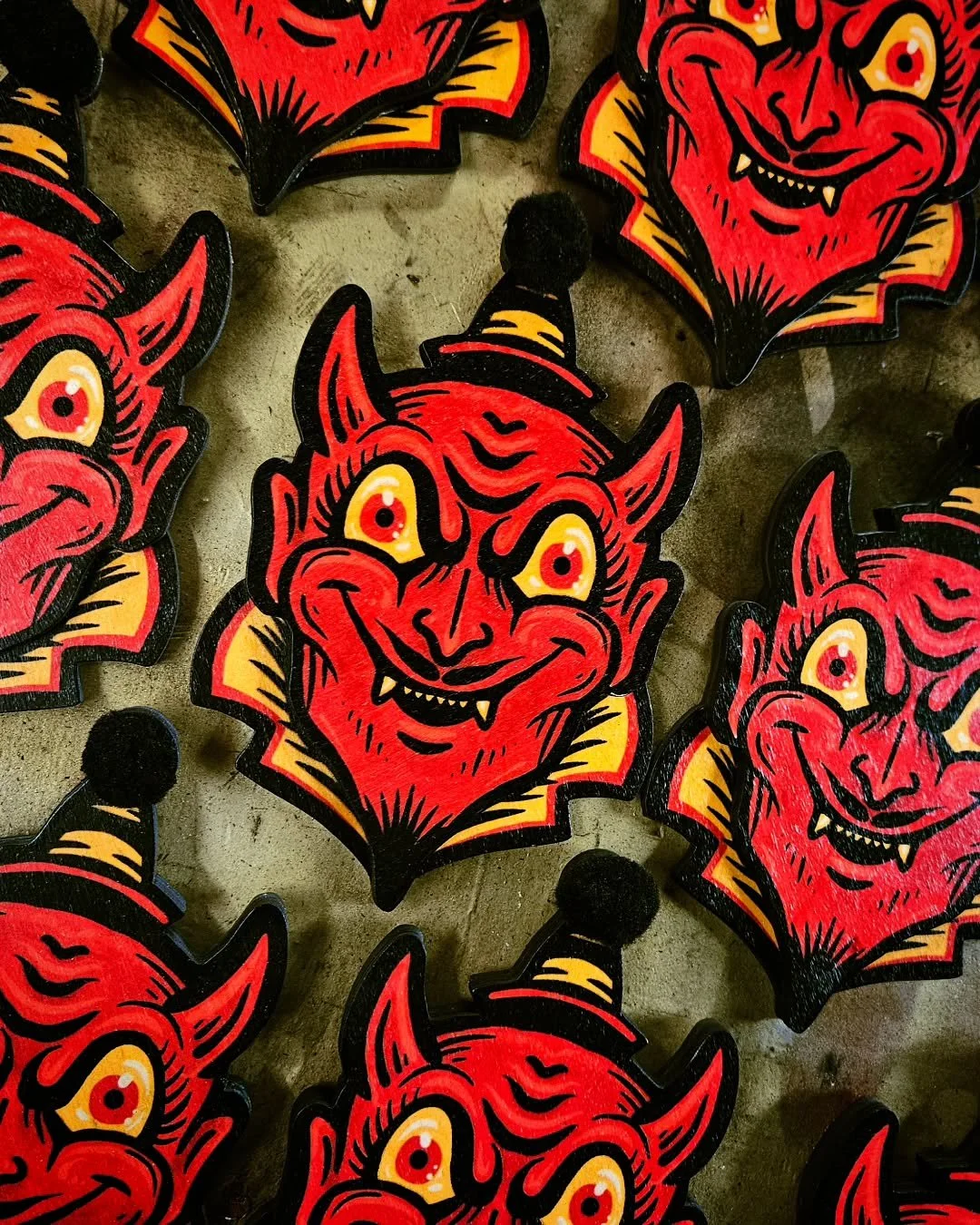 🔥 New layered wood prints are in the shop 🔥 They have little black pom-poms on the hat, because,  as they say,  the devil is in the details 😈 You'll be able to snag these in person at @thepunkmarket next Saturday,  July 25th, and the @odditiesandc