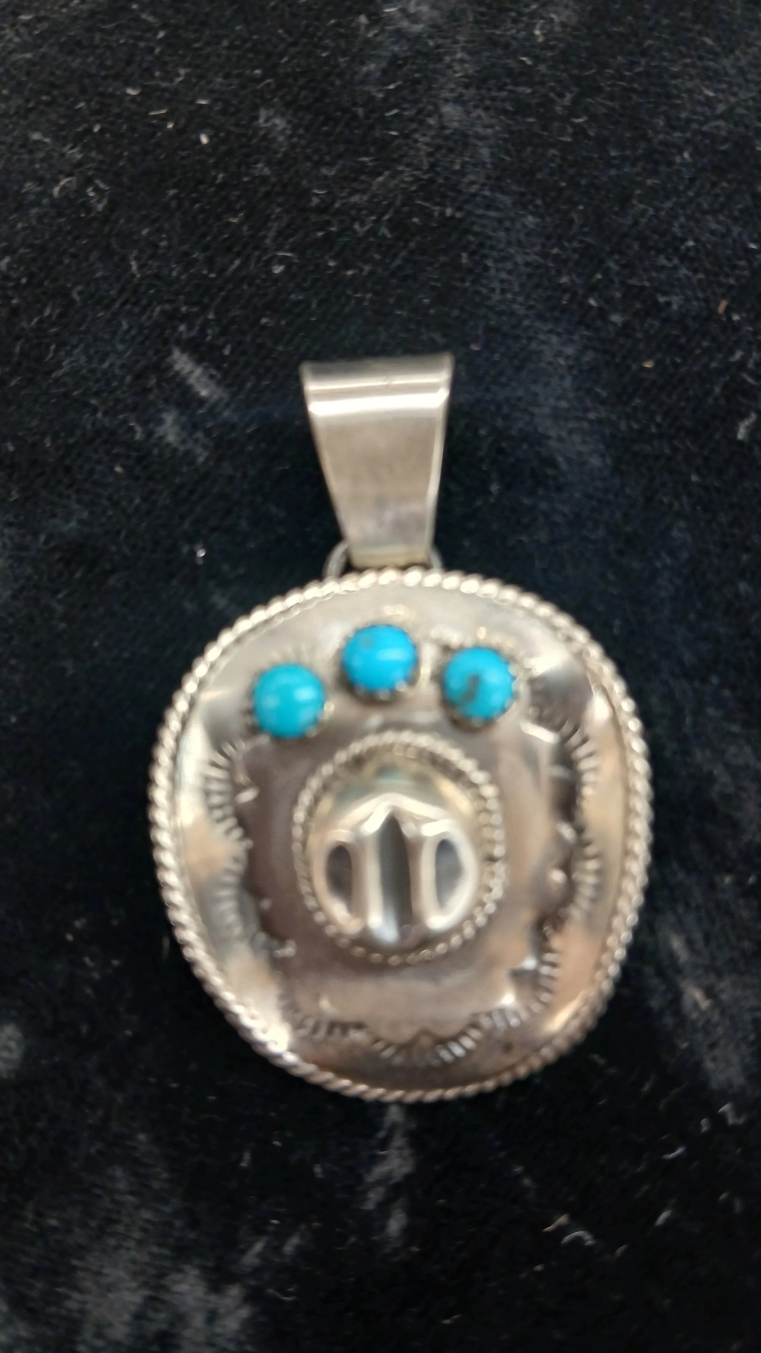 Cowboy hat with turquoise Pendant