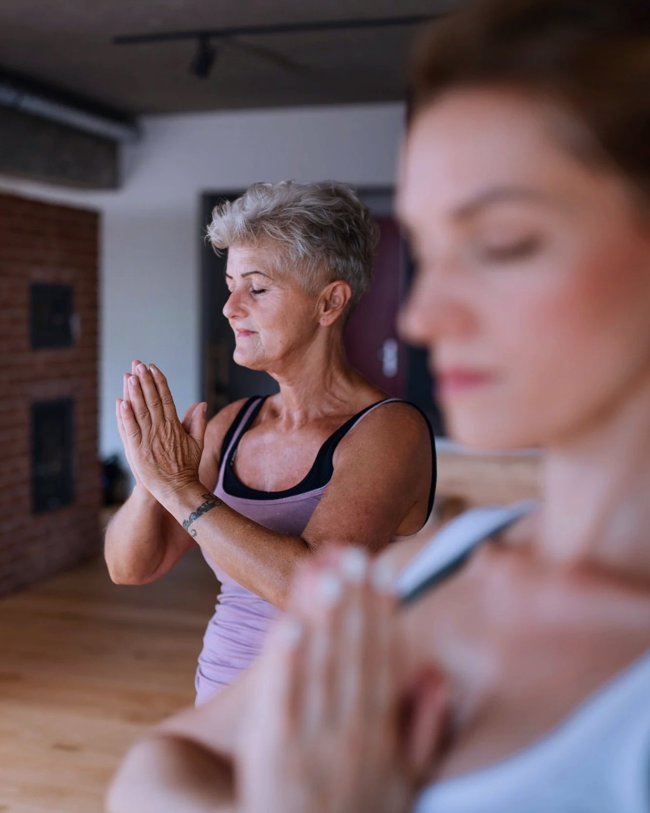 Students participating in a guided Qigong practice session, developing awareness, presence and foundational Qigong skills.