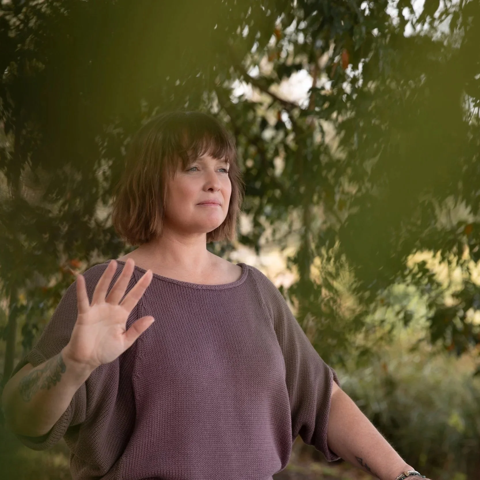 Qigong practitioner practising outdoors in nature for the Presence in the Three Bodies Immersion in Kilcunda