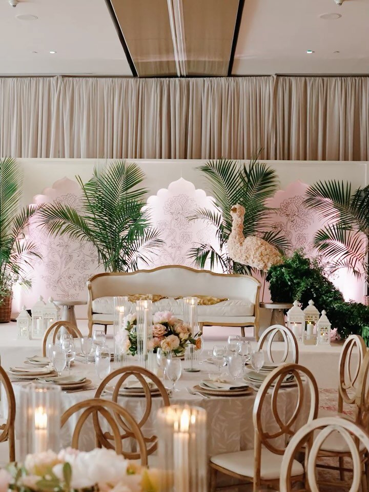 A wedding celebration of beauty, culture, and timeless design for S &amp; V.

Swipe through the magic:
1️⃣ An ethereal reception space adorned with romantic candlelight and lush florals
2️⃣ A tribute to tradition &mdash; the Indian ceremony setup sho