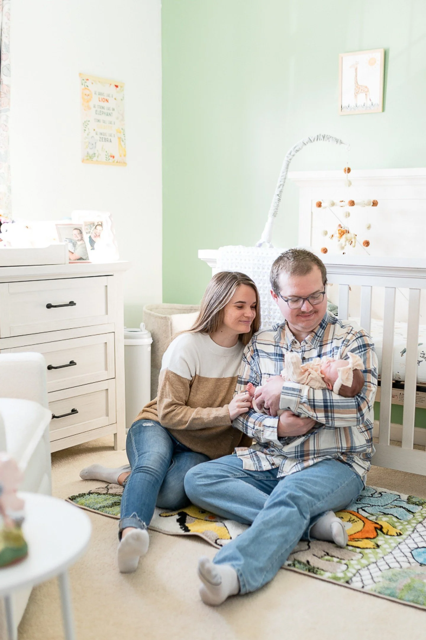 Nicole and Sean have been a couple of NCP since 2022! Sessions with couples who choose to stick around are by far the easiest.  They knew exactly what they wanted out of Baby Amelia's newborn session: lifestyle, connection-focused photos in her nurse