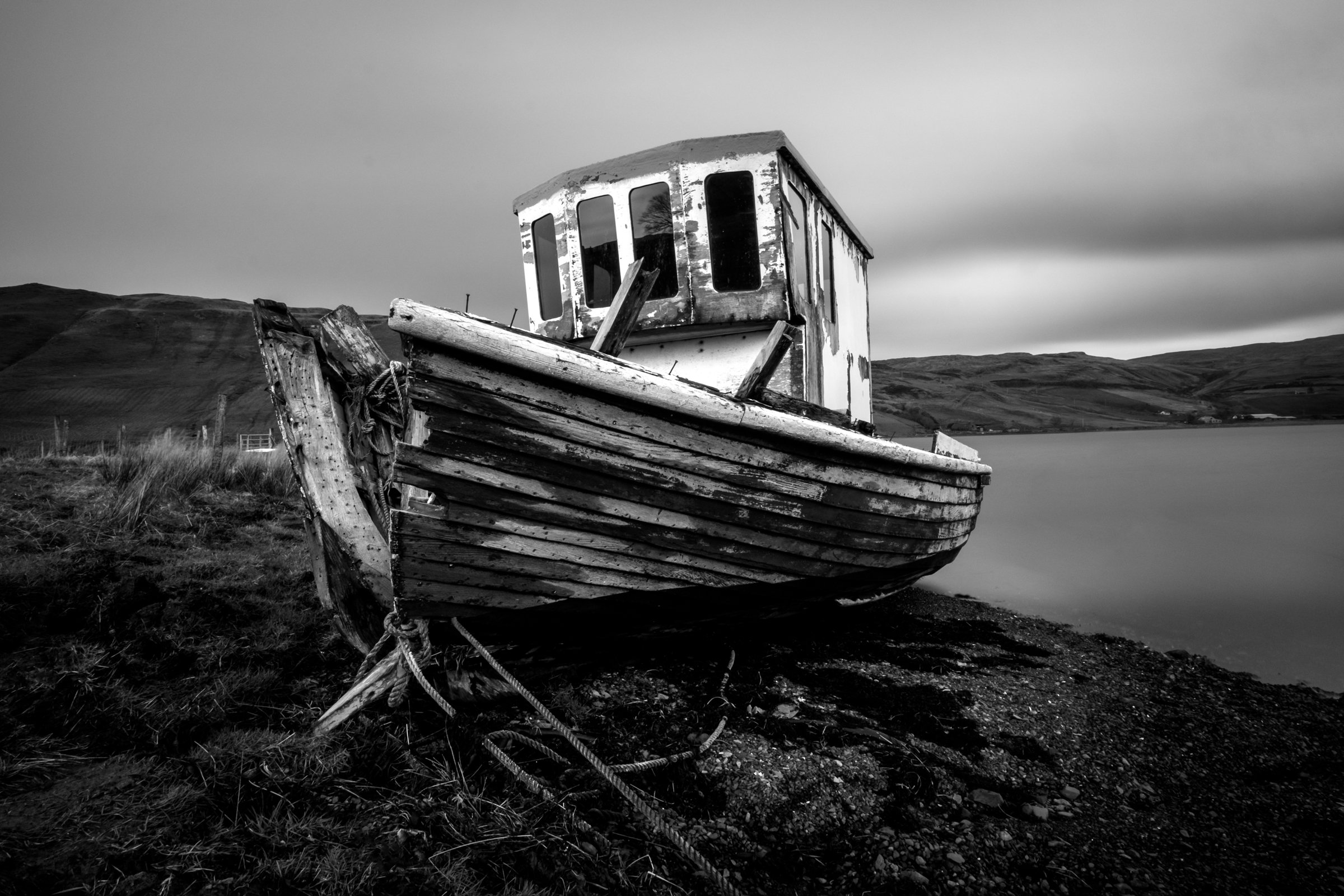 Travel photography in Skye, abandoned boat in Carbost.