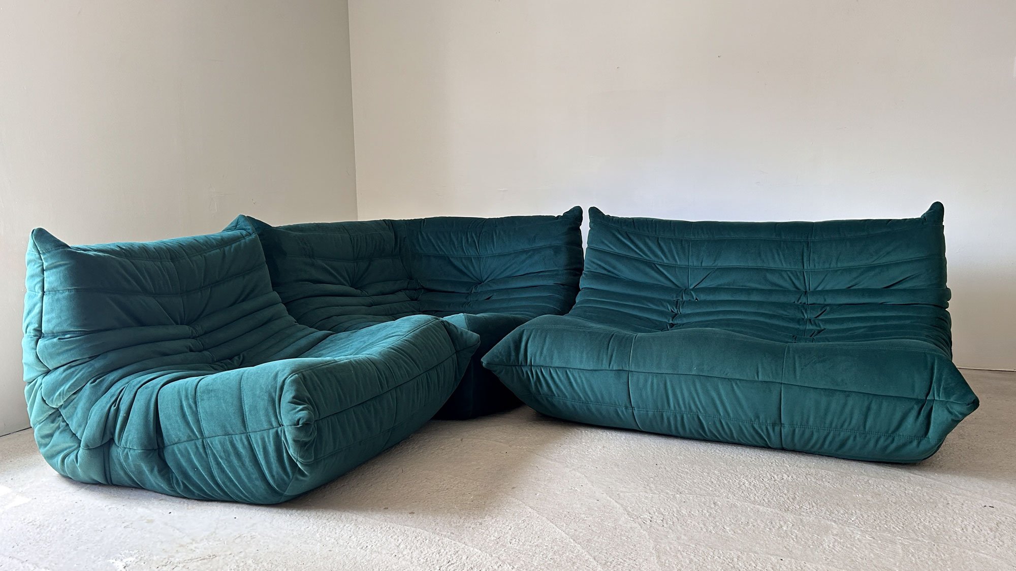 Ligne-Roset-Togo-corner-Suite-Velvet-Deep-Green.jpg