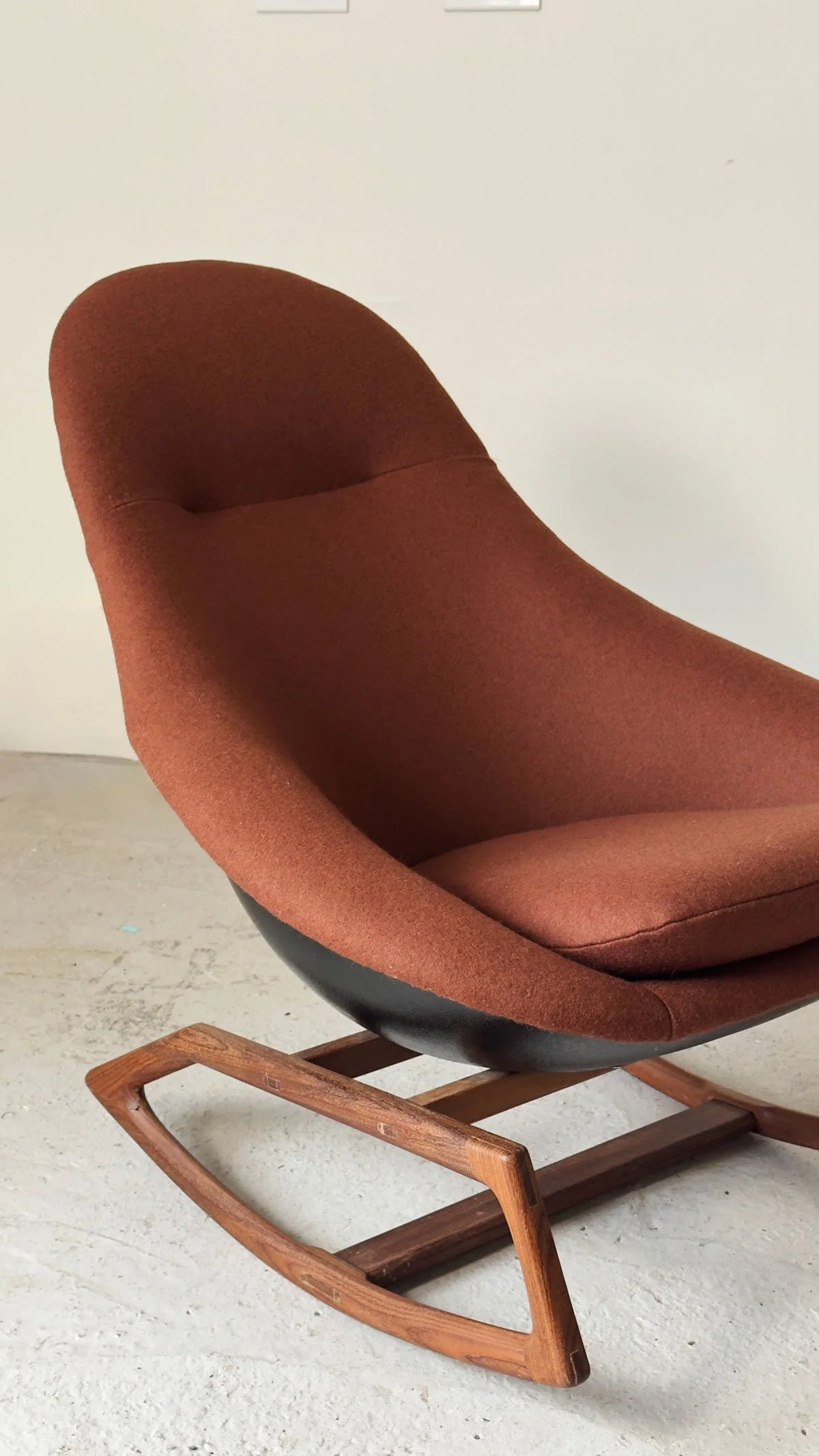 Close-up of burnt sienna wool upholstery on Lurashell Gemini Chair