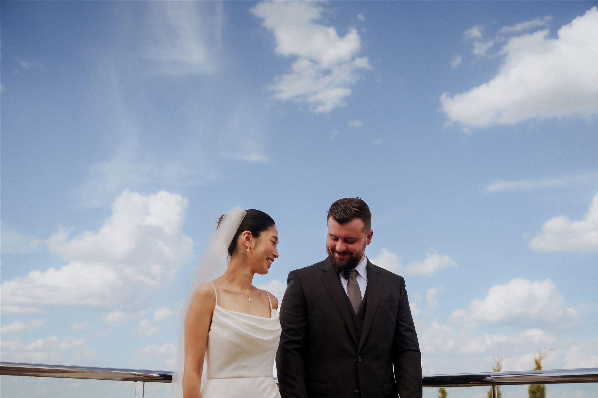 Cute photo of couple enjoying a candid moment at their home microwedding