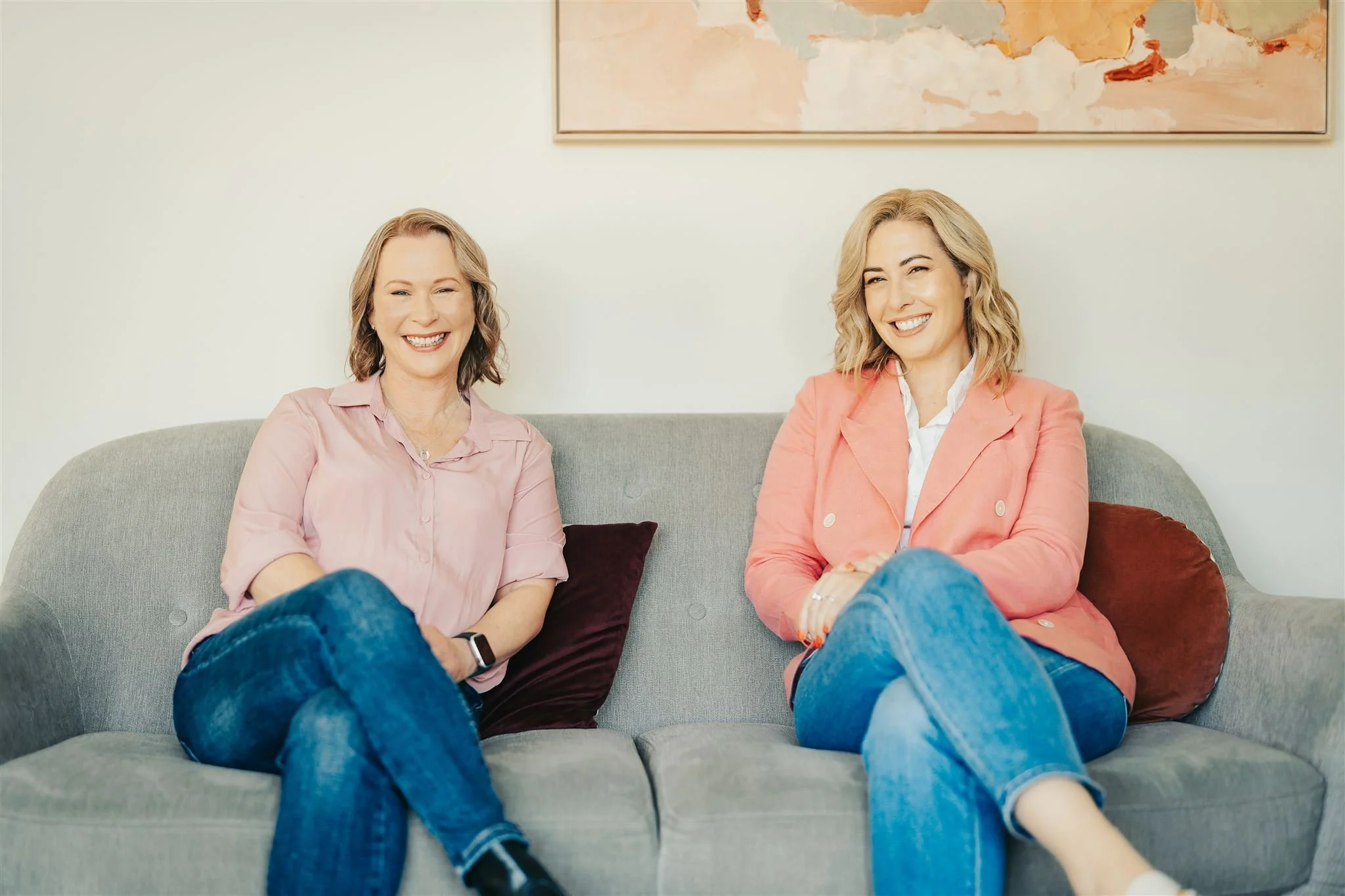 Two female business owners posing for their branding photography shoot