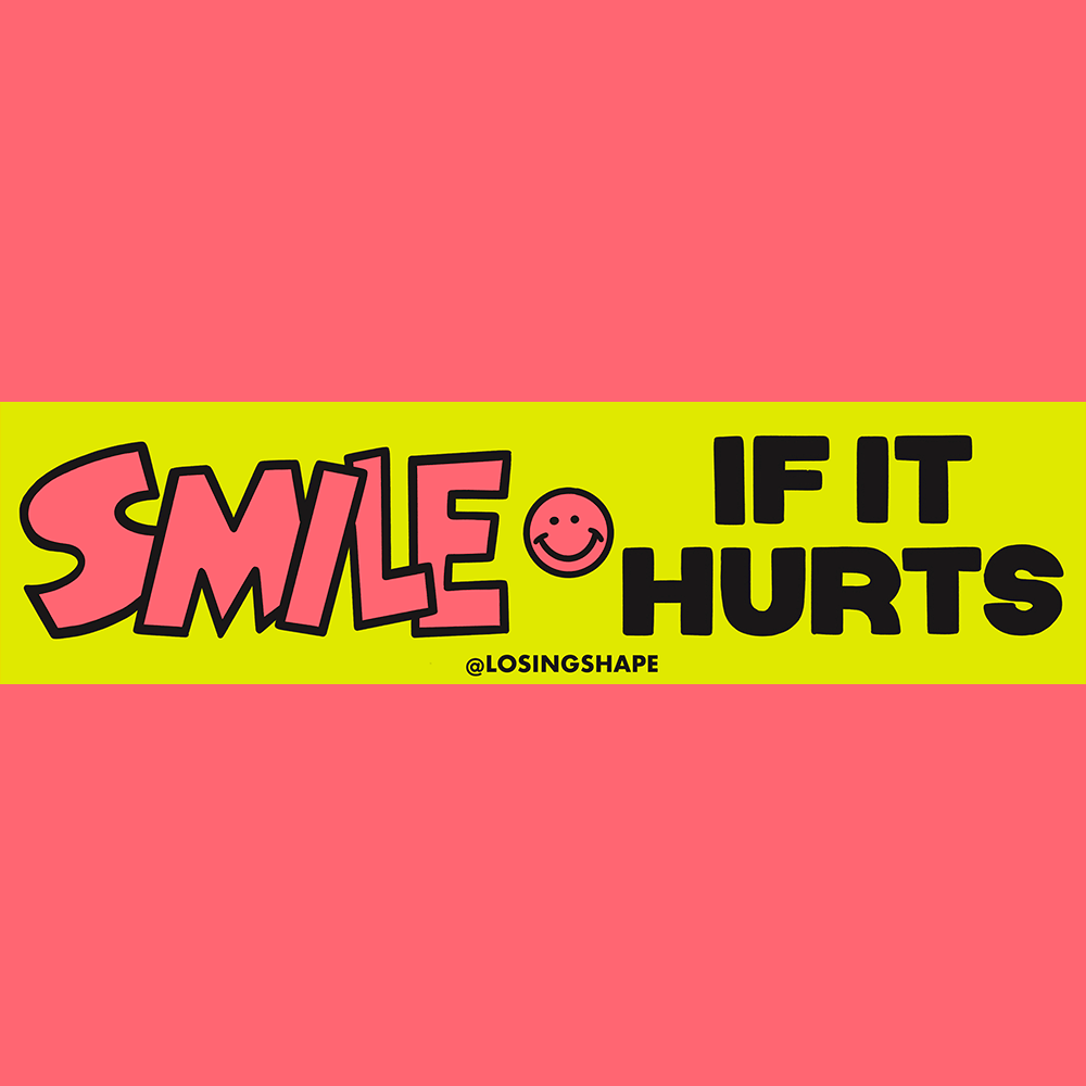 Bumper sticker with smiley face in yellow and red.