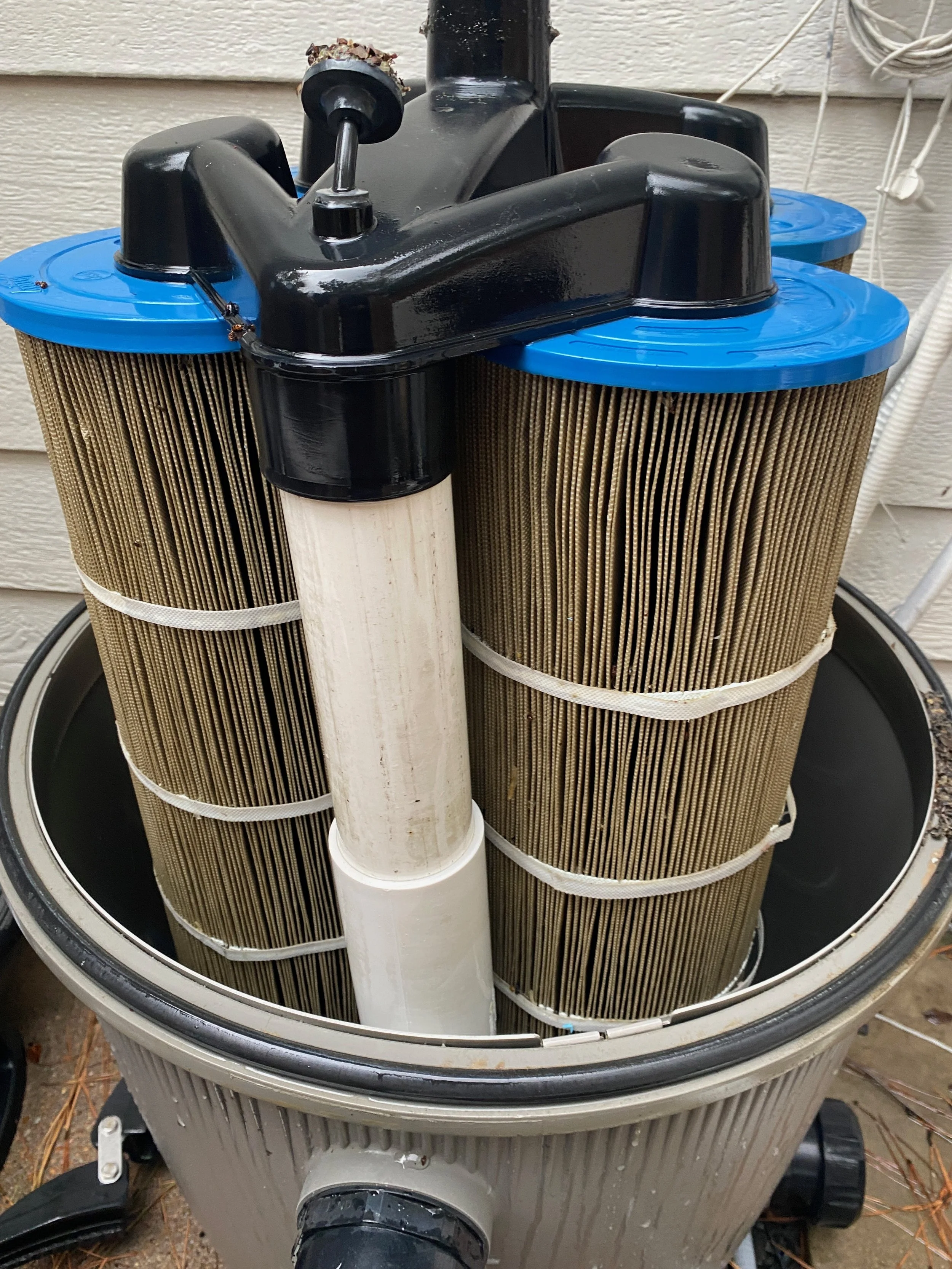Picture of dirty pool cartridge filters that need to be cleaned..