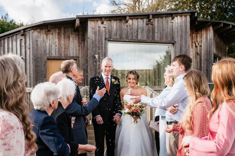 Couple just married in North Devon with luxury wedding cake.