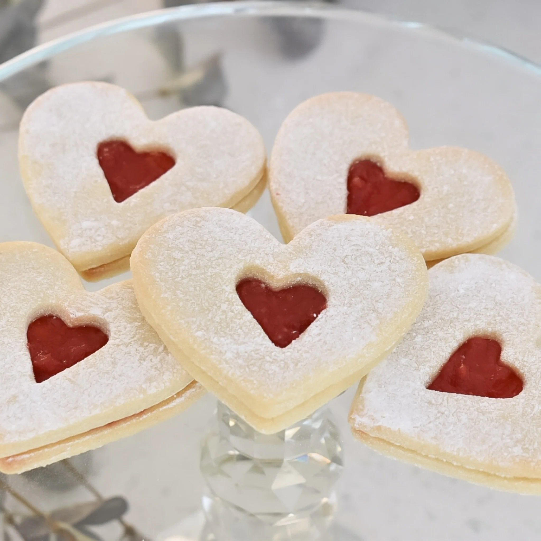 Fresh from the kitchen&hellip; my handmade heart-shaped Jammie Dodgers ❤️✨

Each one is crafted by hand, filled with my own homemade raspberry jam and finished with that little heart cut-out &mdash; sweet, simple and beautifully nostalgic.

They make