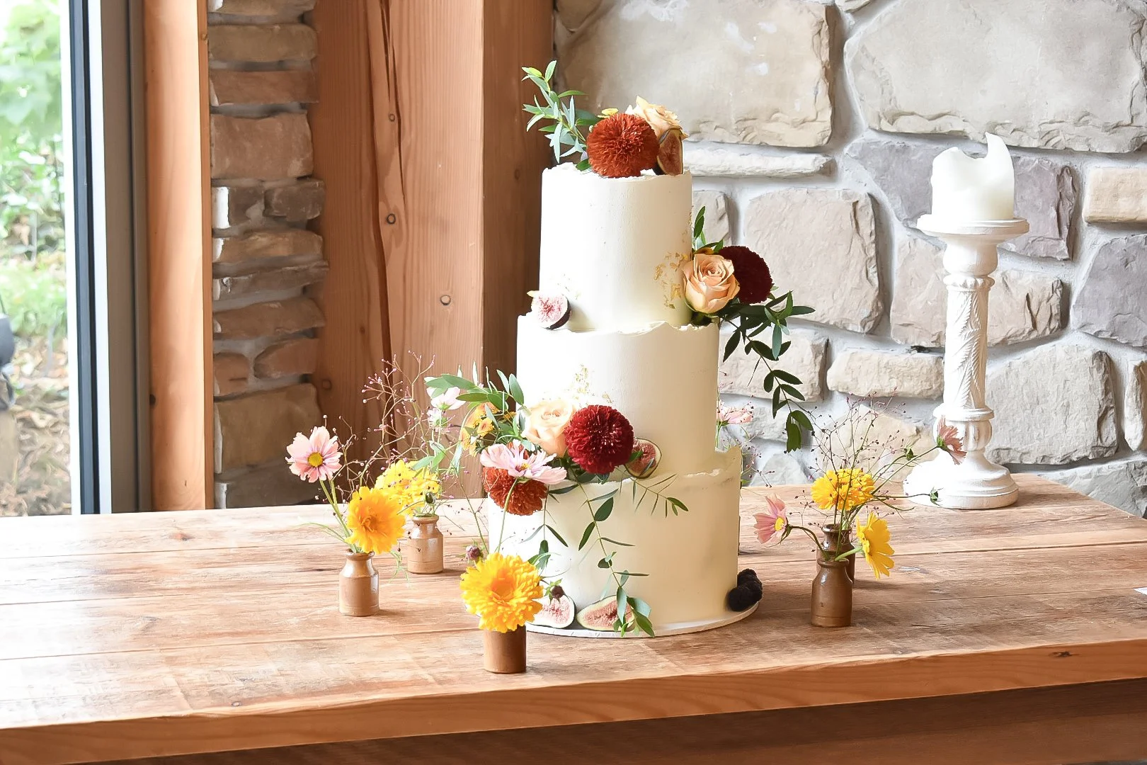 Autumnal themed semi-naked wedding cake in Devon and Cornwall and Central London