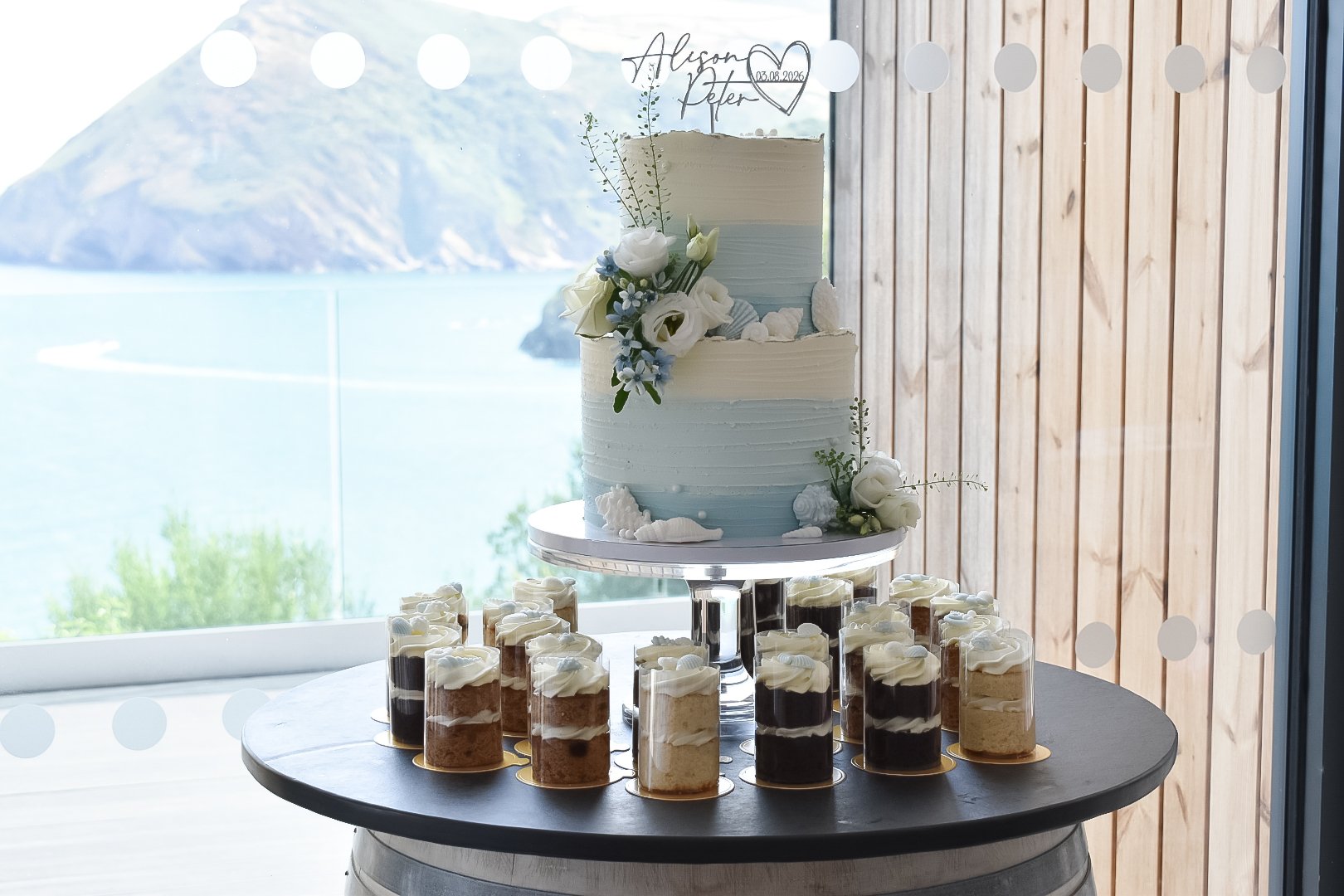 Coastal beach themed wedding cake at Sandy Cove Hotel in Devon