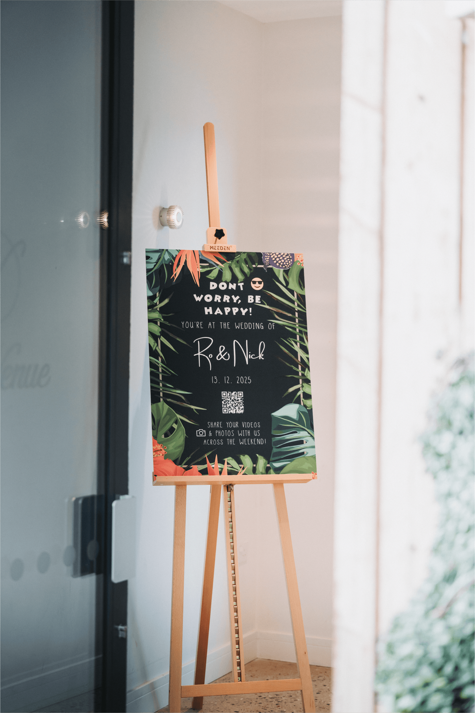 Tropical themed wedding welcome sign.