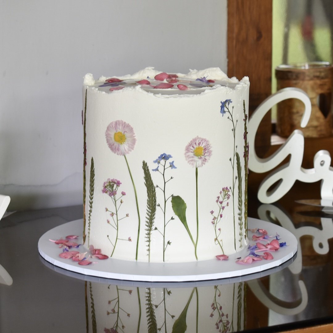 Presed Flower Wedding Cake at Sandy Cove Hotel, Devon