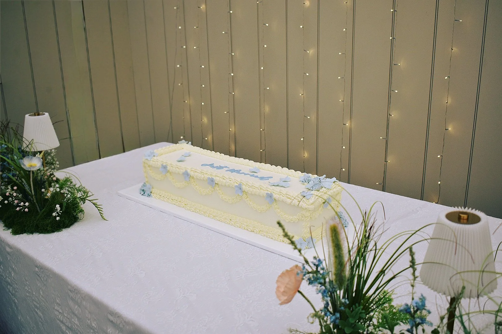 Long, table runner, runway wedding cake at Trevenna Barns.