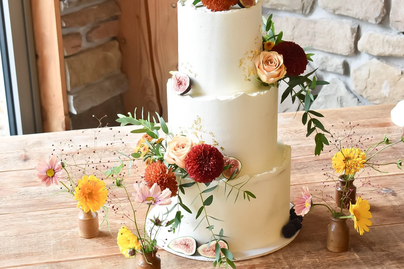 Autumnal themed wedding cake with table styling in Devon.