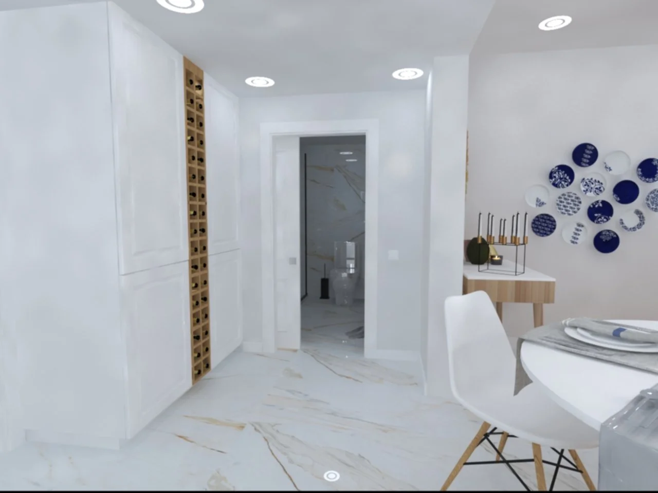 Home Staging de Moradia, Torres Vedras.
Interior de cozinha moderna com paredes e piso de mármore branco, armários brancos, com nicho vertical em madeira para garrafeira.