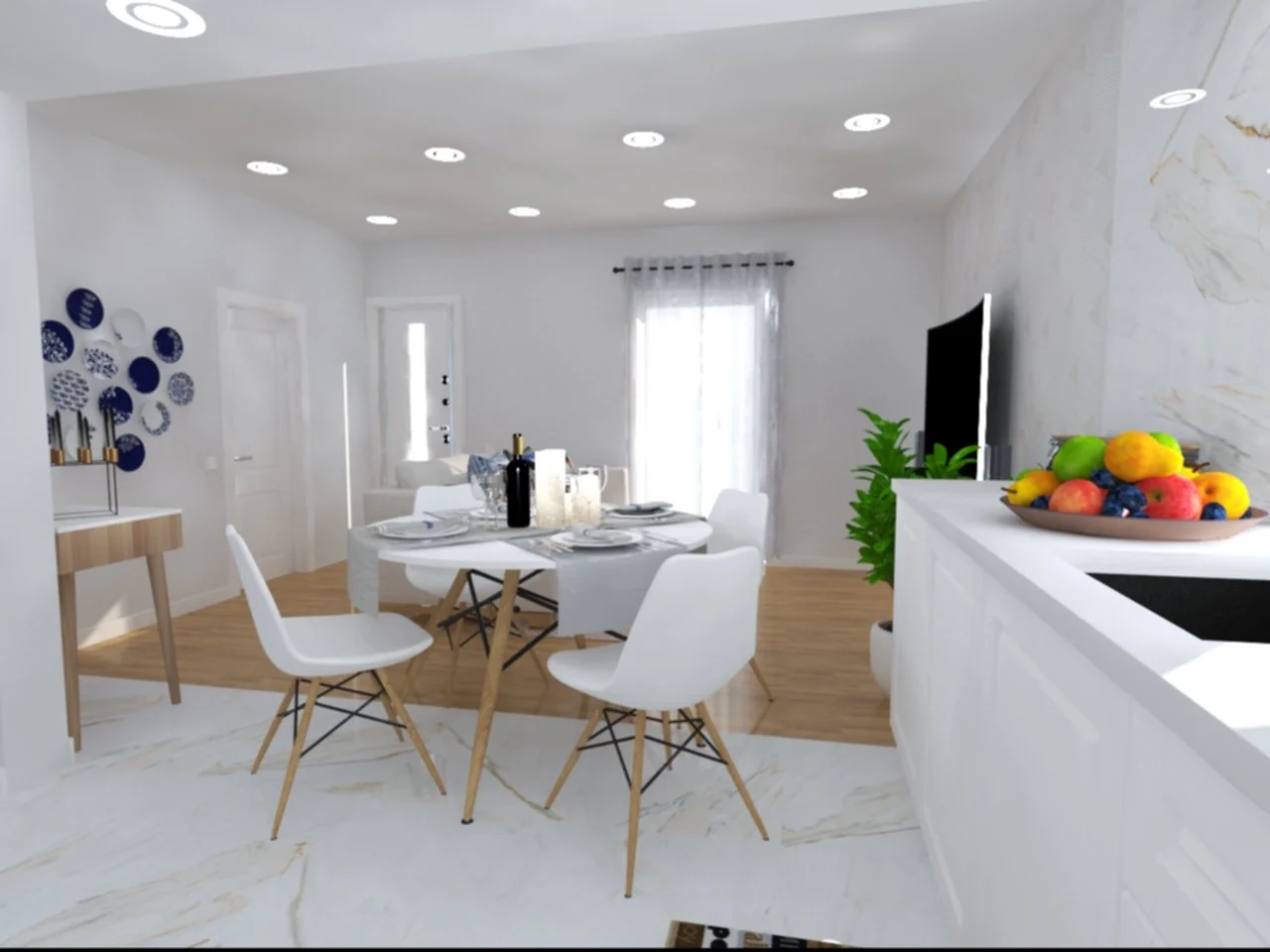 Home Staging de Moradia, Torres Vedras.
Área de cozinha moderna com mesa de jantar redonda, cadeiras brancas e plantas.