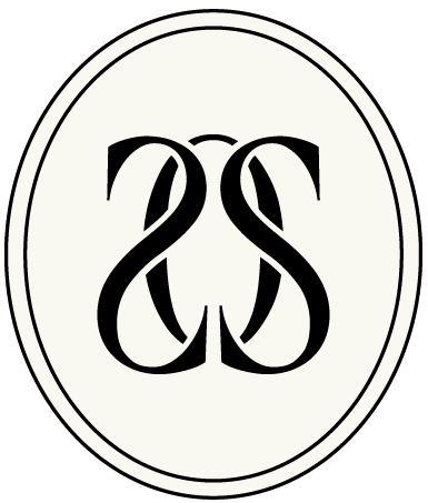 Monogrammed logo with the letters S and S intertwined inside an oval shape.