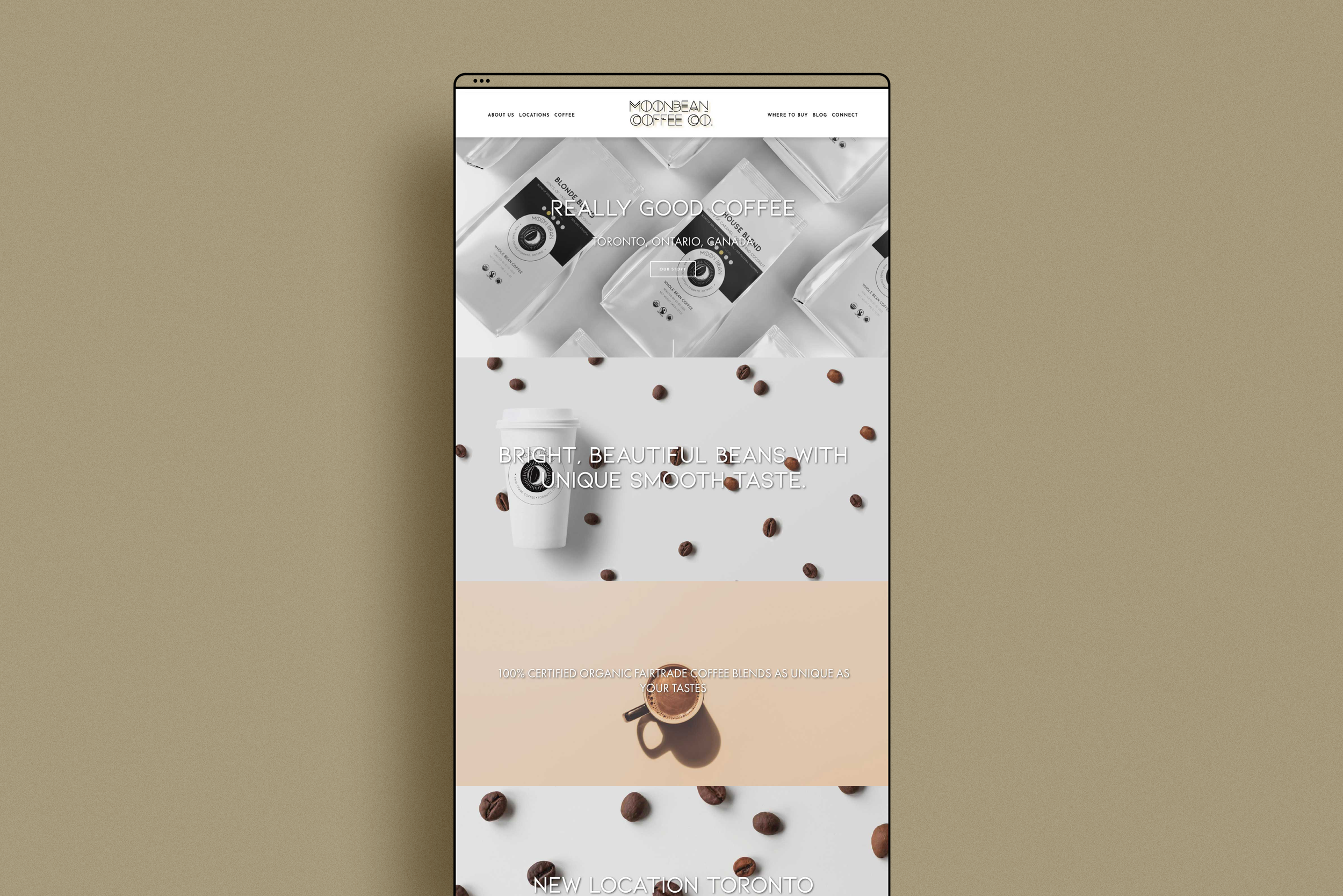 A smartphone displaying a website for Moonbean Coffee Co., featuring images of coffee beans, coffee packages, and a coffee cup, with text about the coffee's taste and qualities.