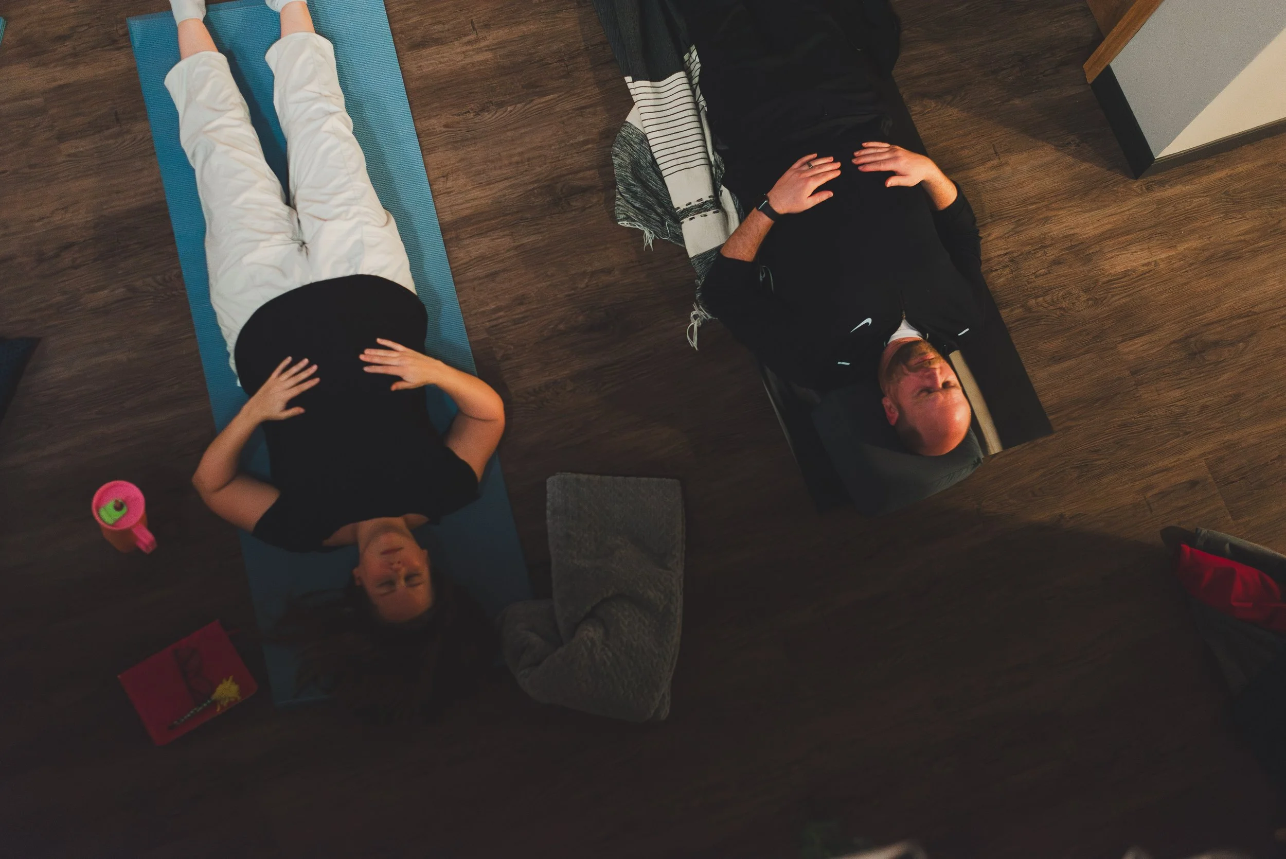 Breathwork session - laying on yoga mats