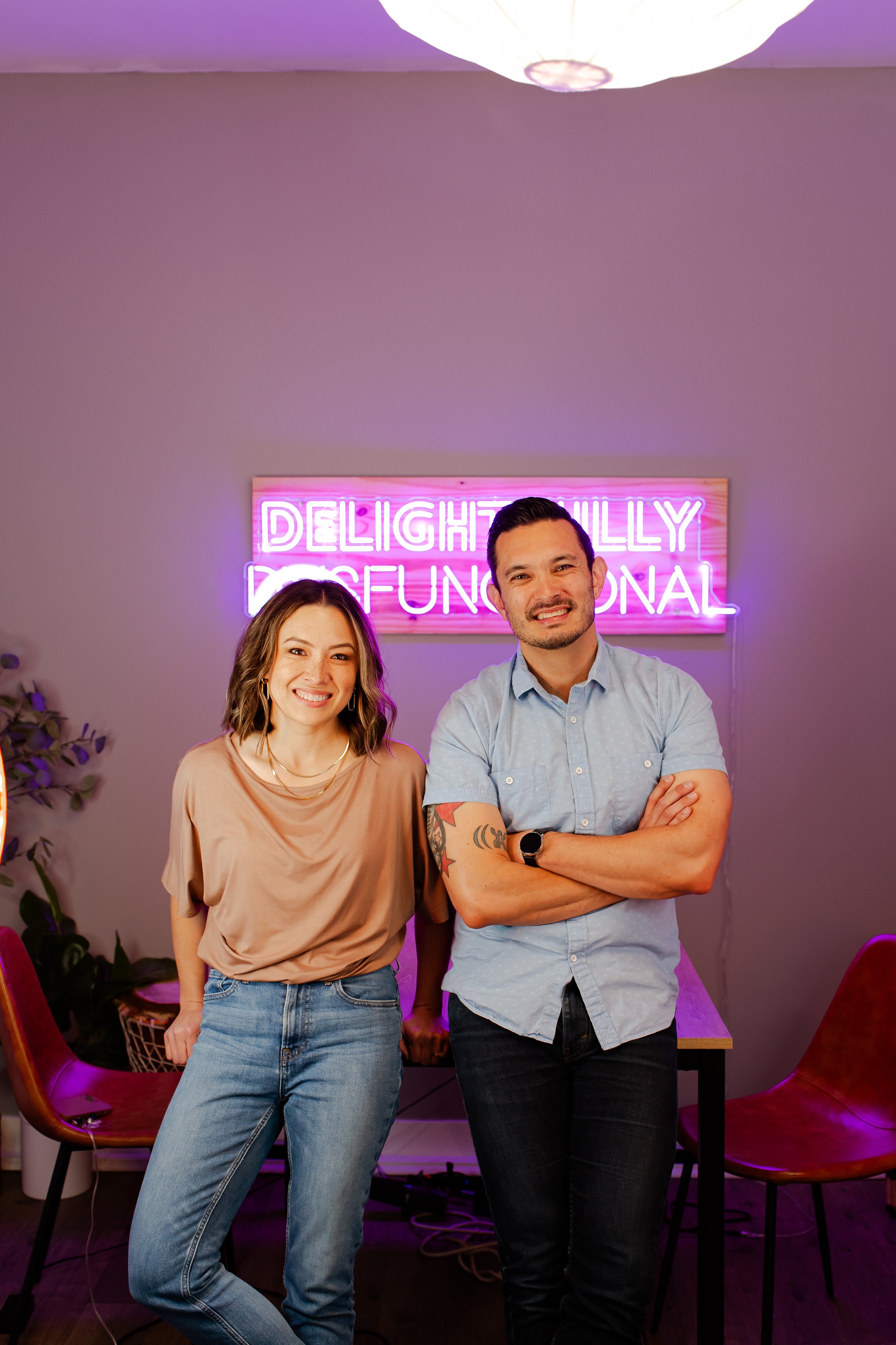 Headshots for podcast hosts, in their podcast studio.