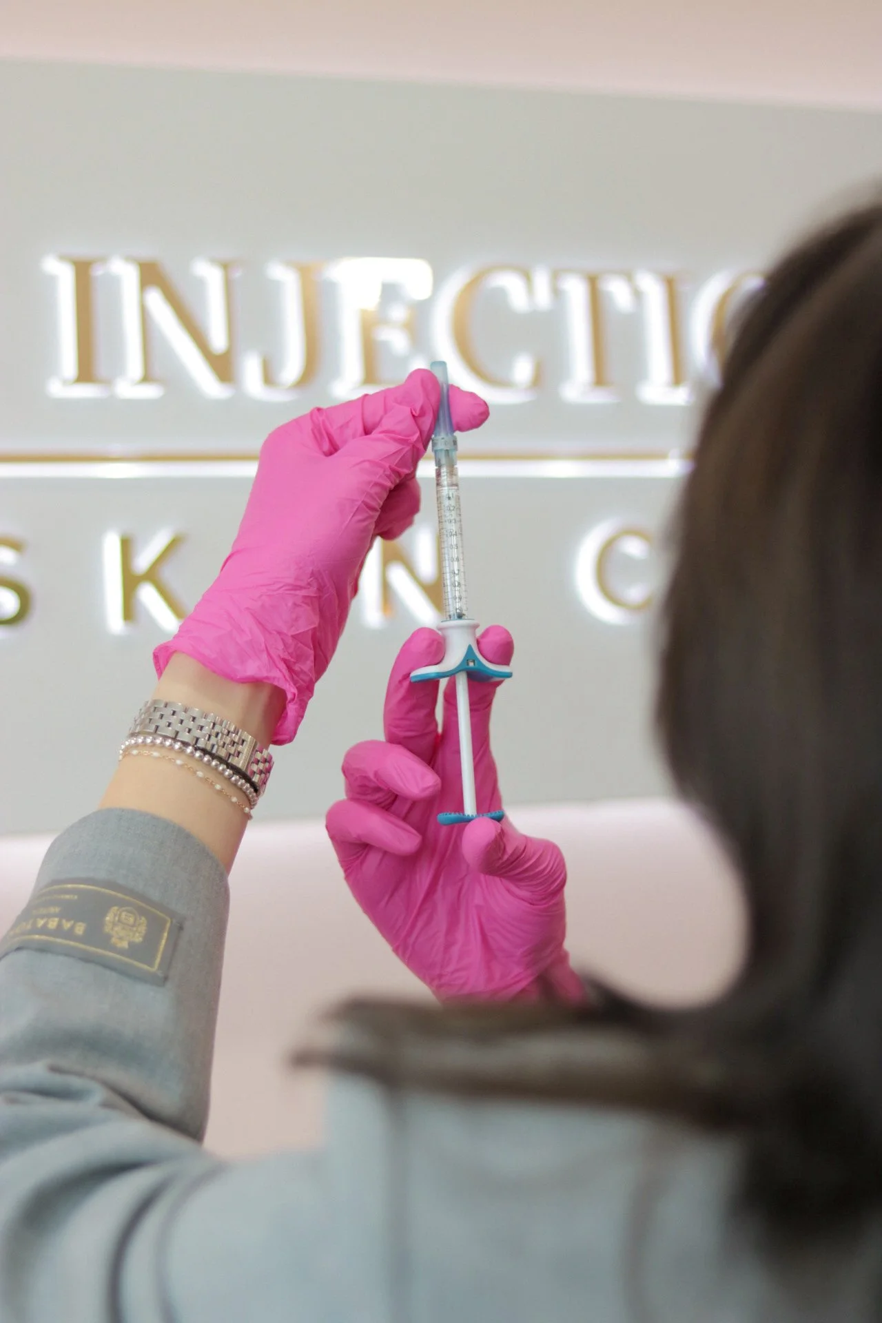 Preparing injectable treatment at The Injection Nurse Skin Clinic in Winnipeg