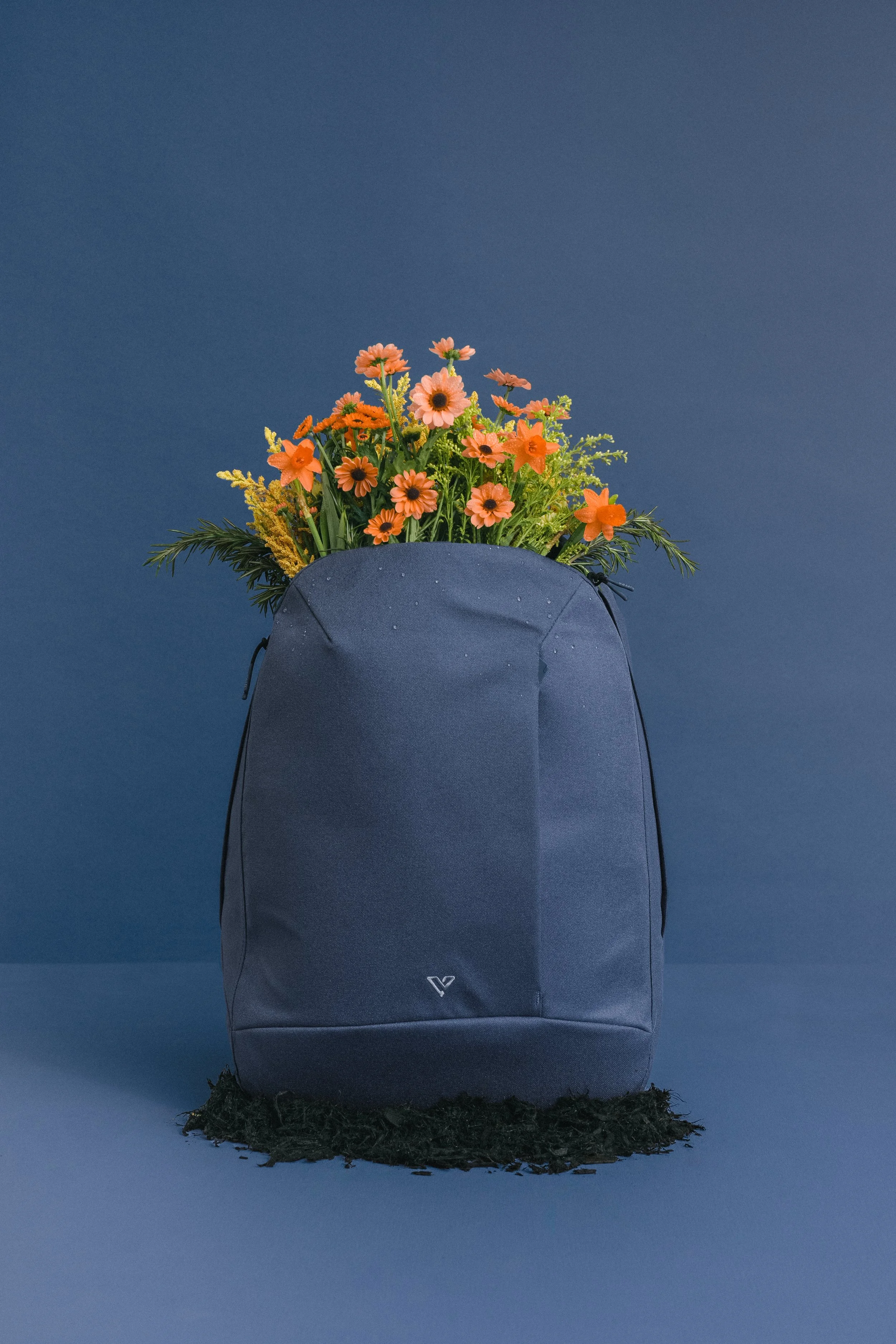 astoria-backpack-blue-orange-flowers.jpg