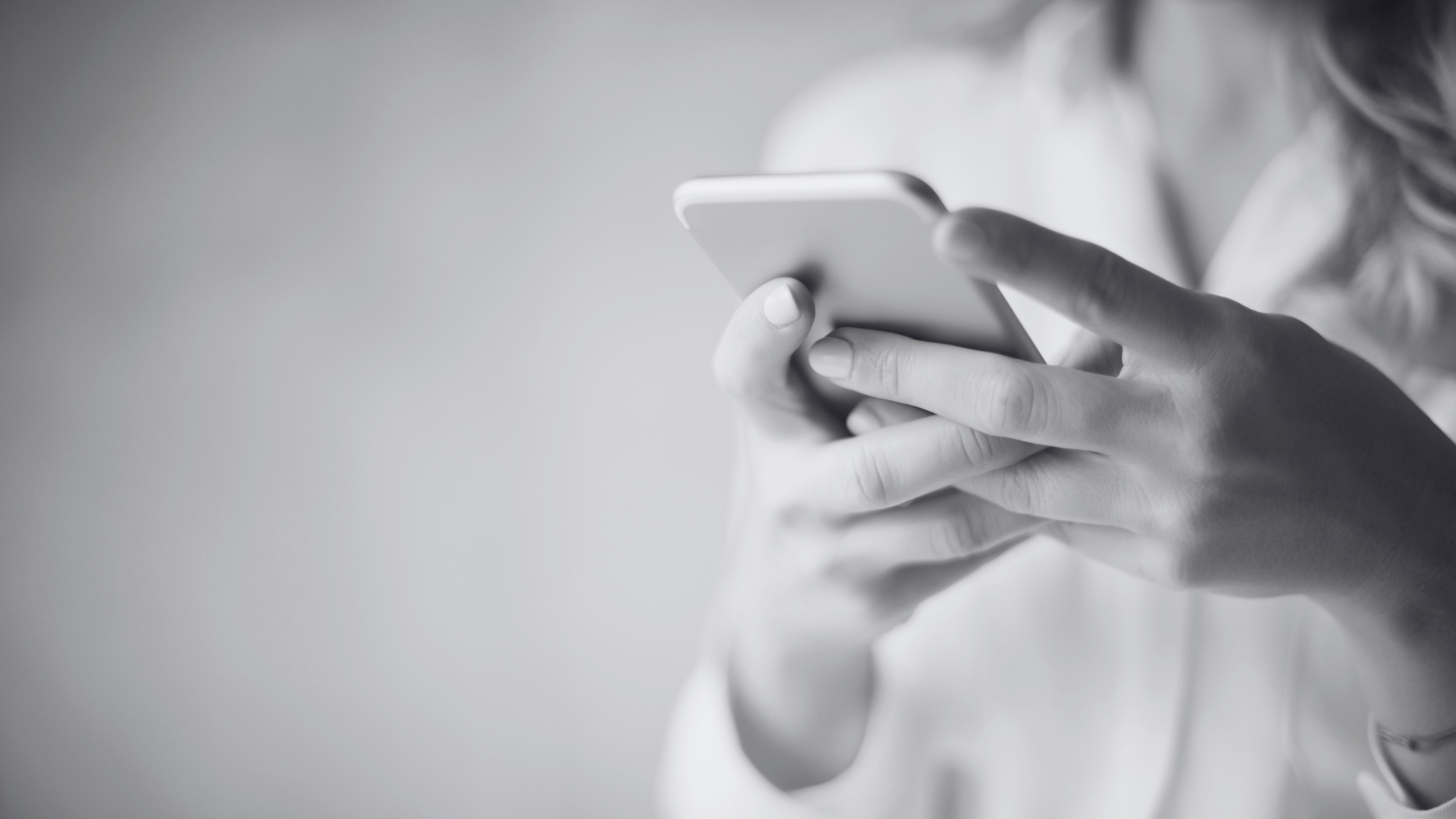close up of woman texting on cellphone