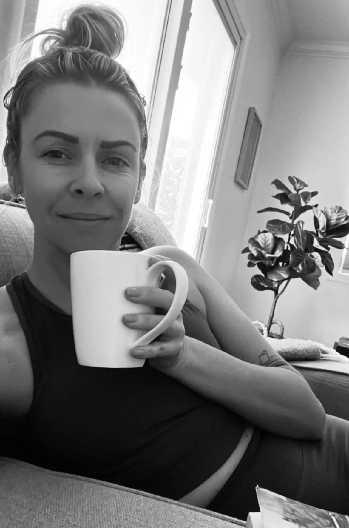 Rachel Bosworth drinking a cup of coffee