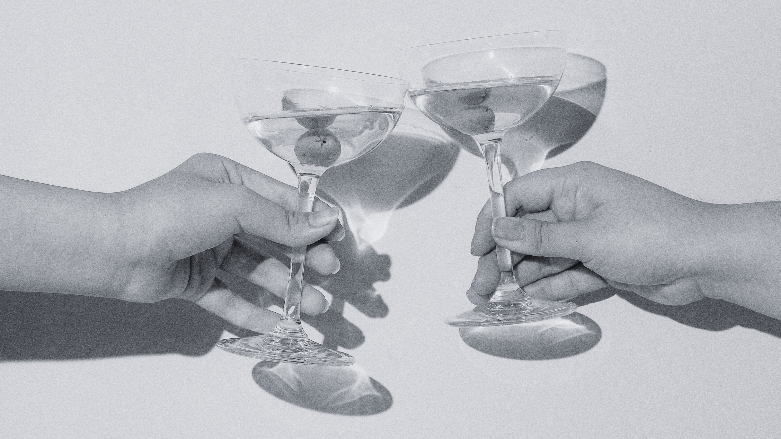 Cheers with martinis to celebrate client projects