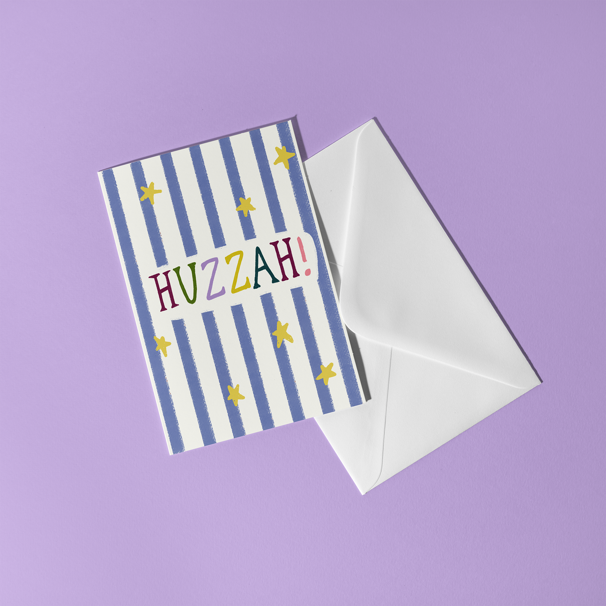 Greeting card with blue stripes and colorful letters, reading "Huzzah"