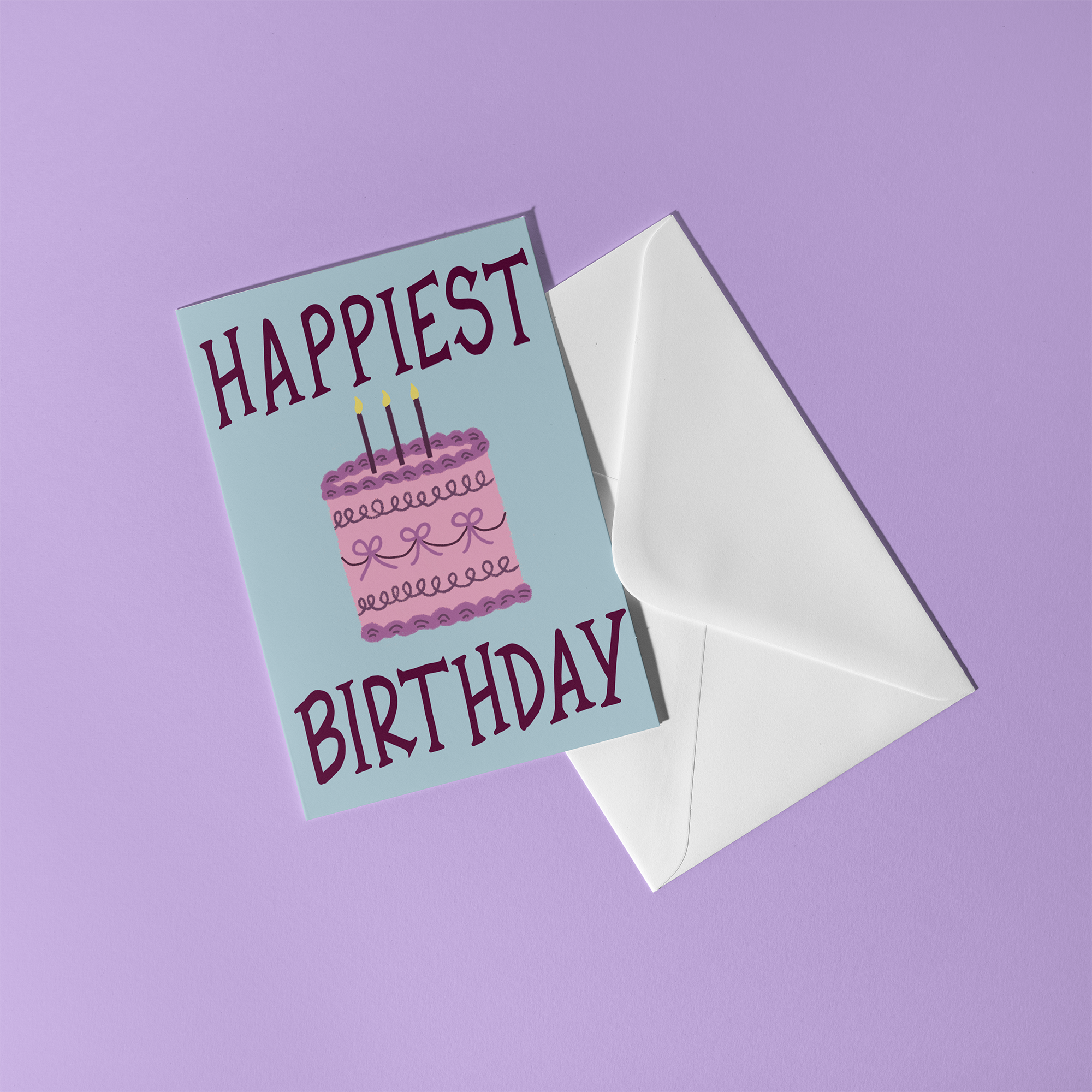 Greeting card featuring vintage-style cake, reading "Happiest Birthday"