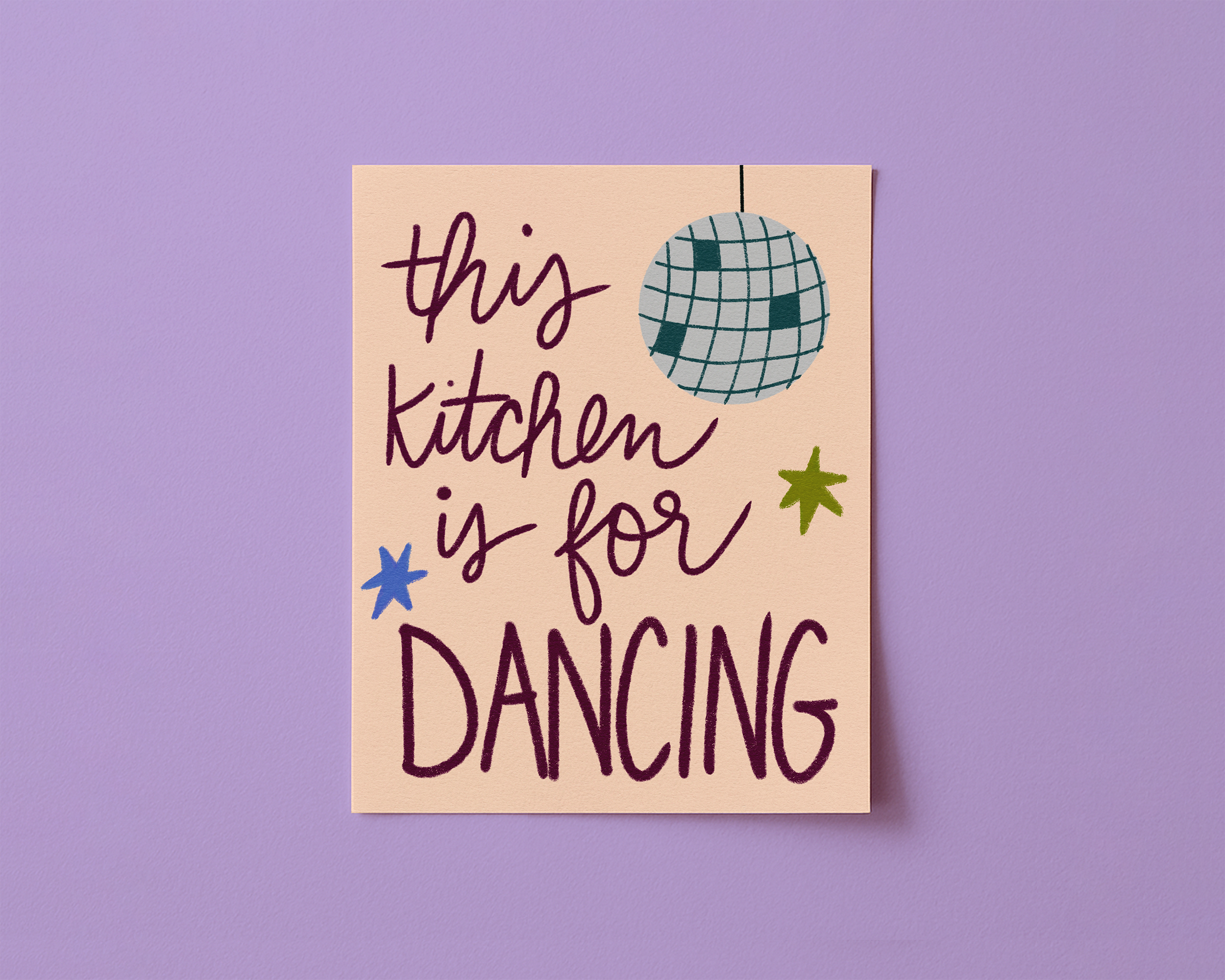 Art print with a disco ball and blue and yellow stars, reading "This kitchen is for dancing"