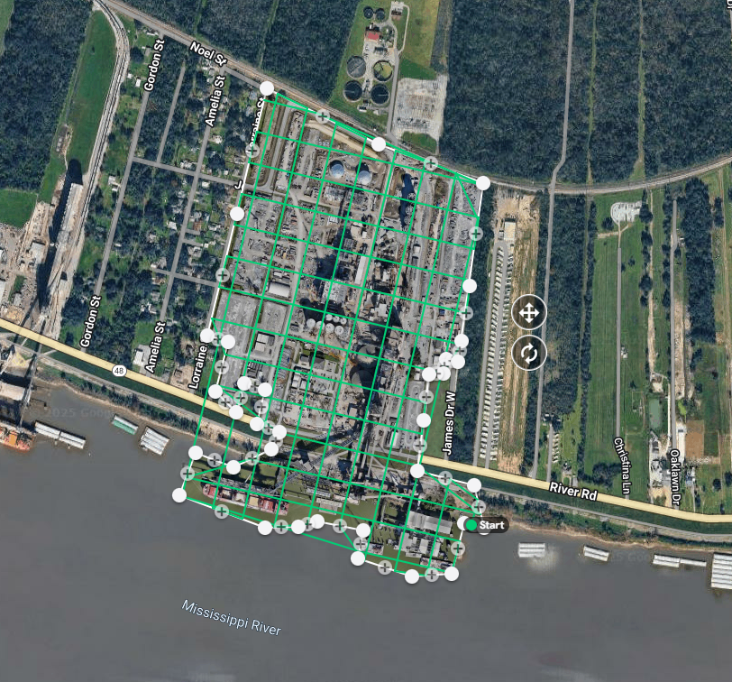Map of an industrial area along the Mississippi River with a marked route, starting on River Rd W. near the river, and extending through streets like Lorraine St and Amelia St, with grid lines and waypoints indicated.