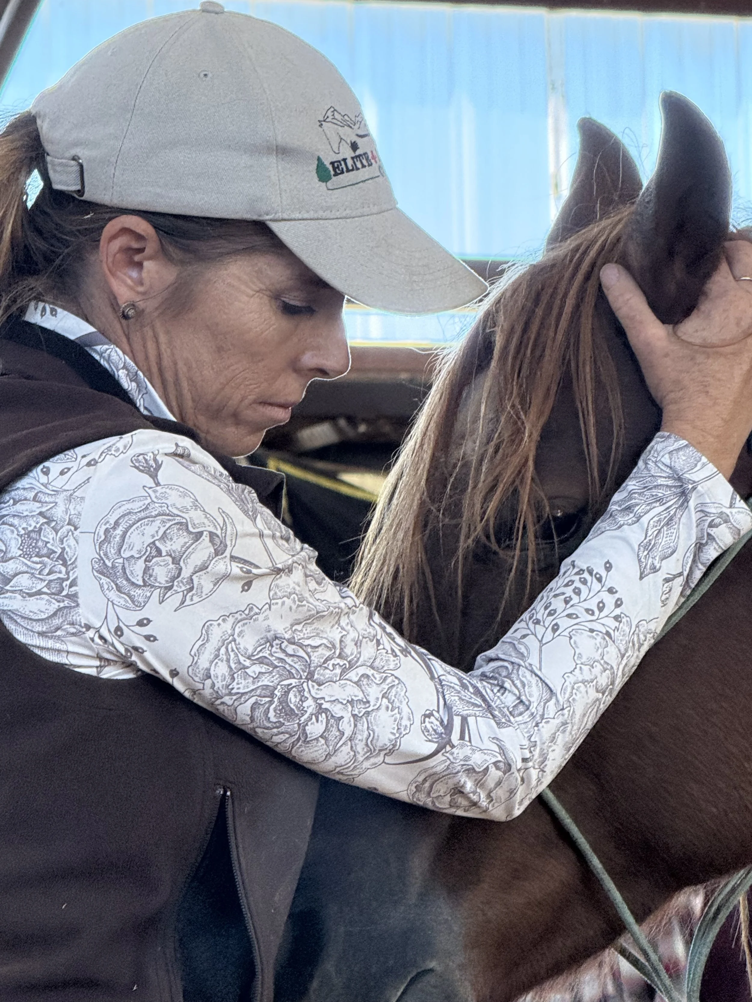 Image of Gina Hluska working on horse