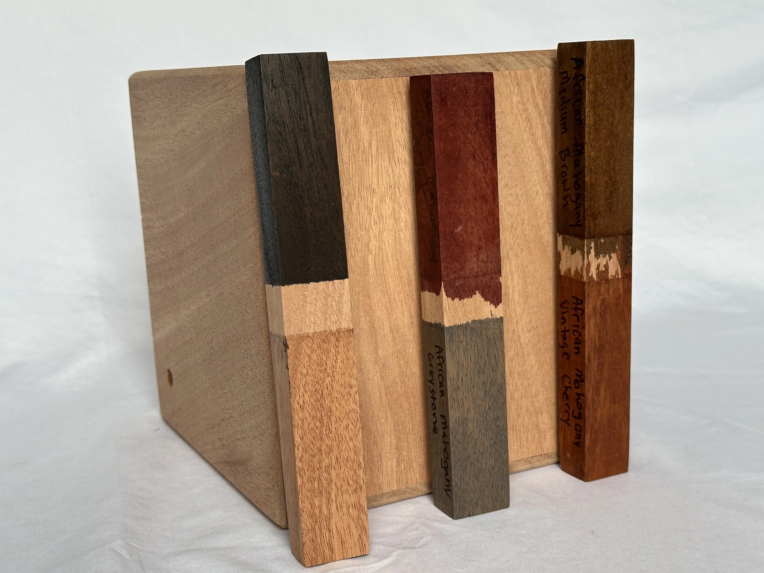 Top Shelf African Mahogany Cocktail Smoker Box SB00004
Popular stains: Espresso, Merlot, Greystone, Medium Brown, and Vintage Cherry. 
Or keep it natural and apply poly (bottom-left)