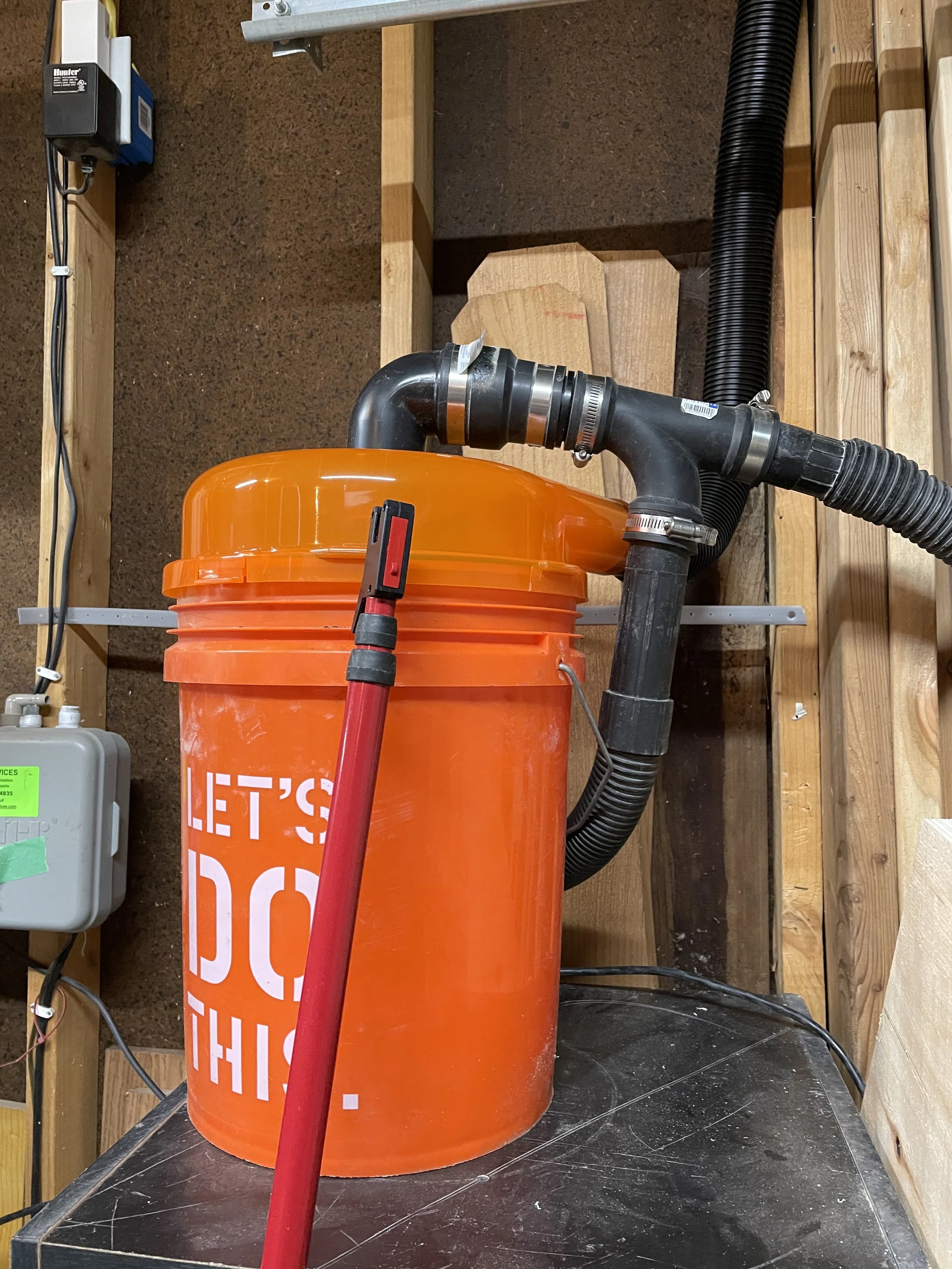 Carly Tackles...DIY Dust Collection on a budget. I wasn't ready to commit to a large dust collection unit, in the meantime, i rigged up 2 shop vacs.