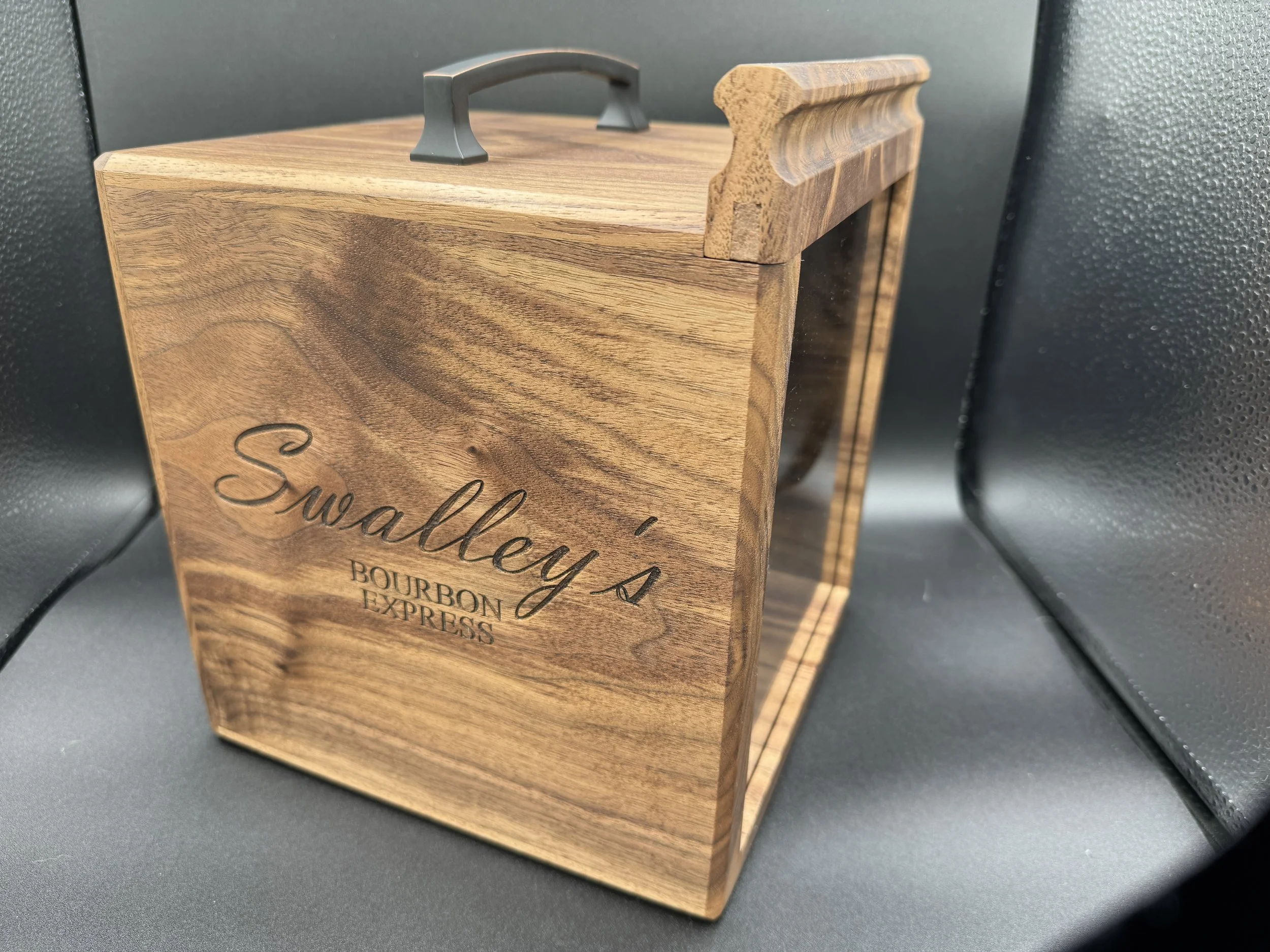 Wooden smoker box with the inscription 'Swalley's Bourbon Express' engraved on the front.