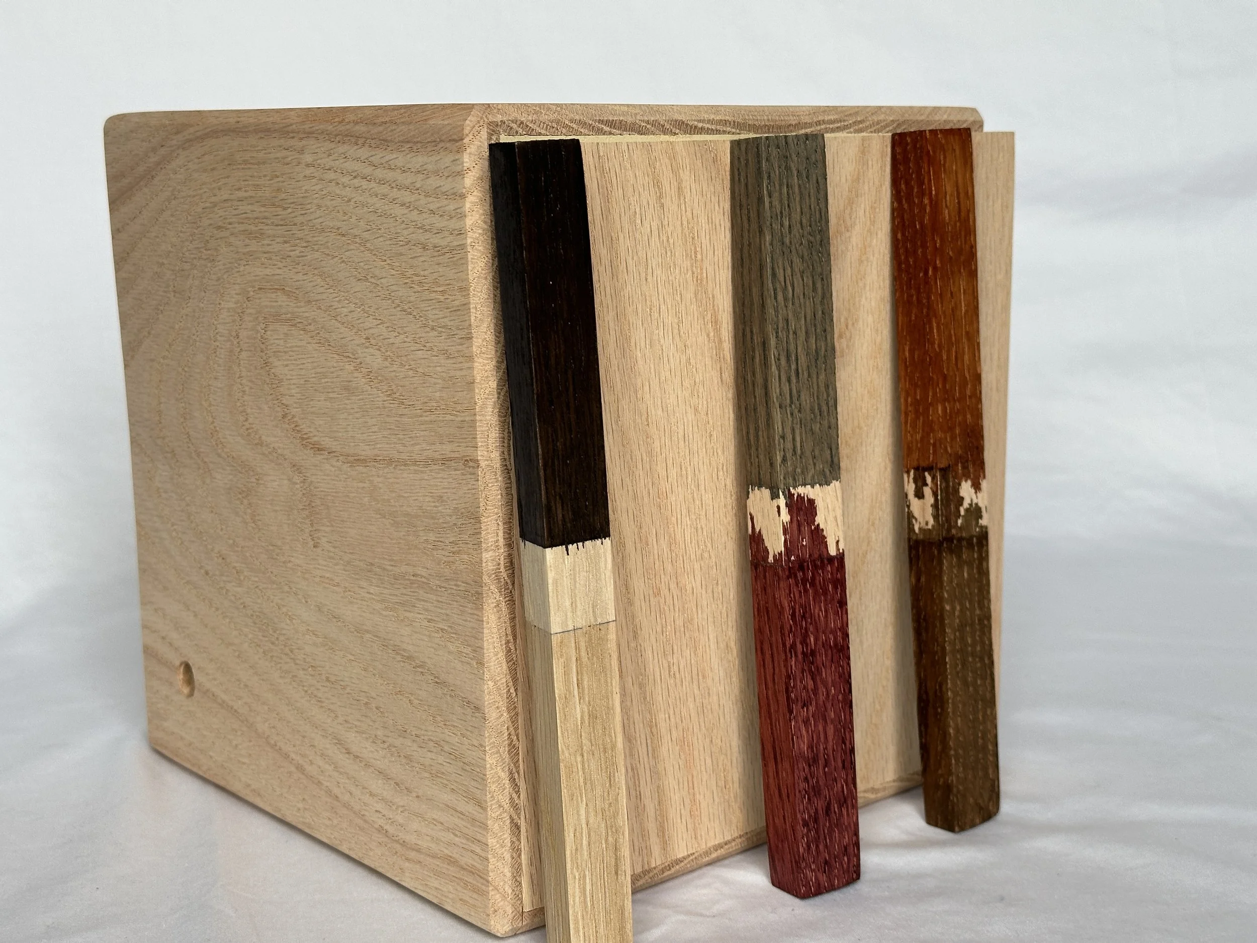 Red Oak Top Shelf Cocktail Smoker Box SB00008
Popular stains: Espresso, Merlot, Greystone, Medium Brown, and Vintage Cherry. 
Or keep it natural and apply poly (bottom-left)