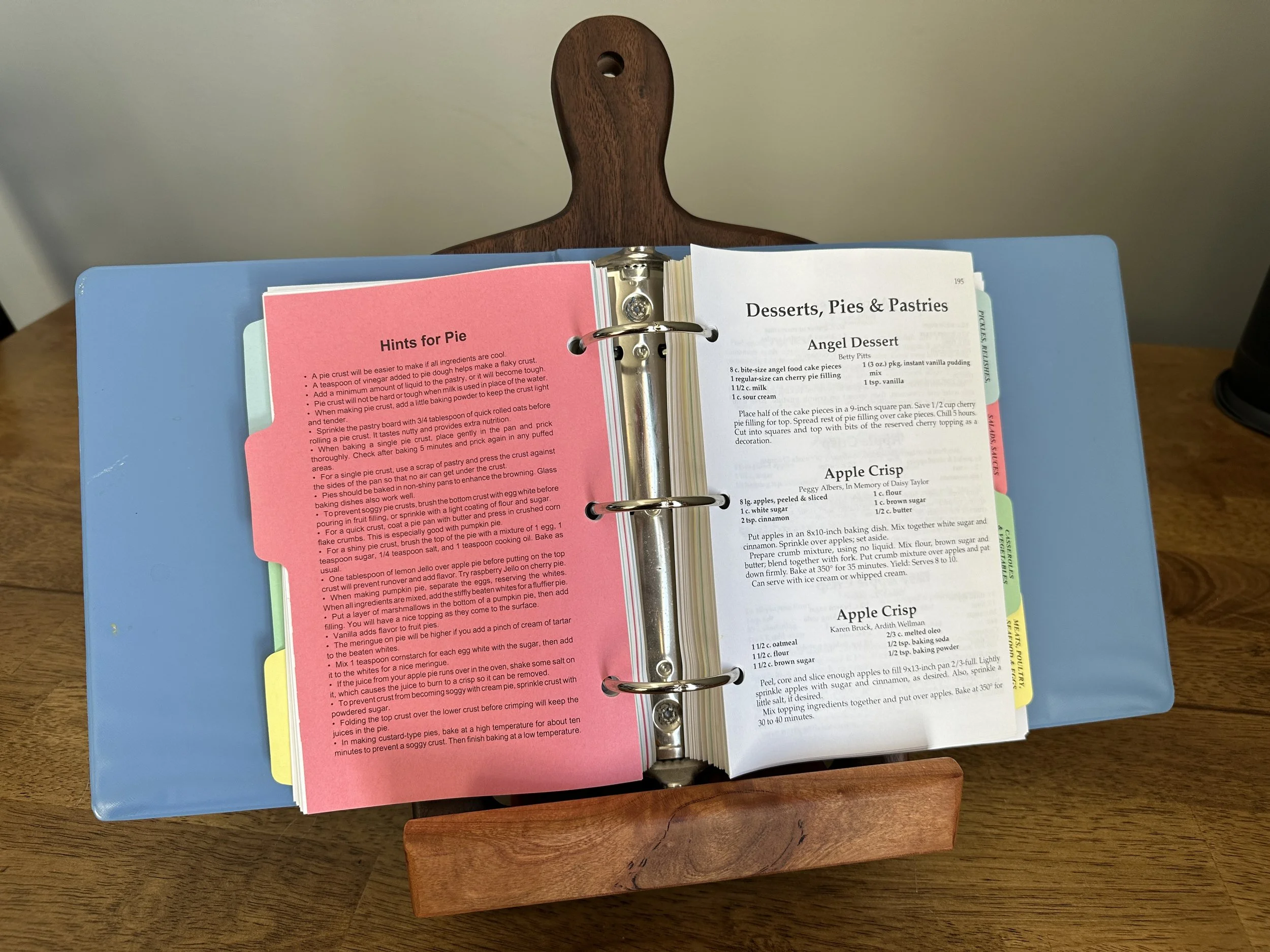 The recipe holder / stand can be adjusted to holder larger recipe books and recipe binders