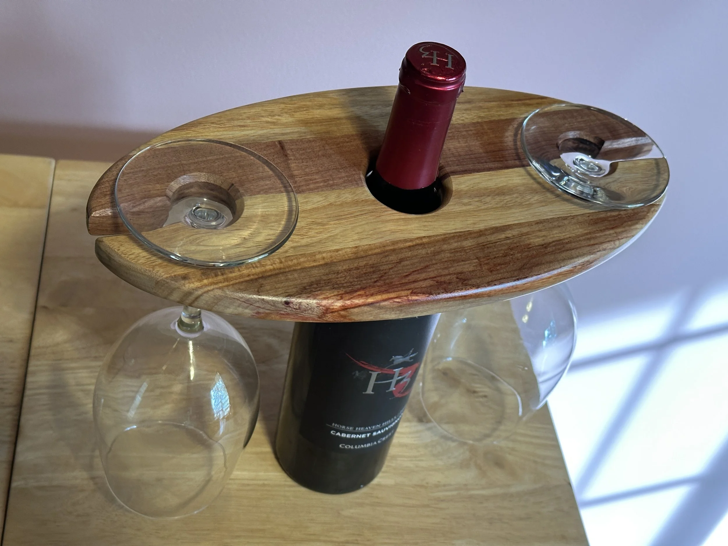 Wine Glass Caddy - Featuring Exotic Hardwoods like Canarywood & Macacauba. This Wine Glass Caddy will hold your wine glasses in place even when one is removed. 