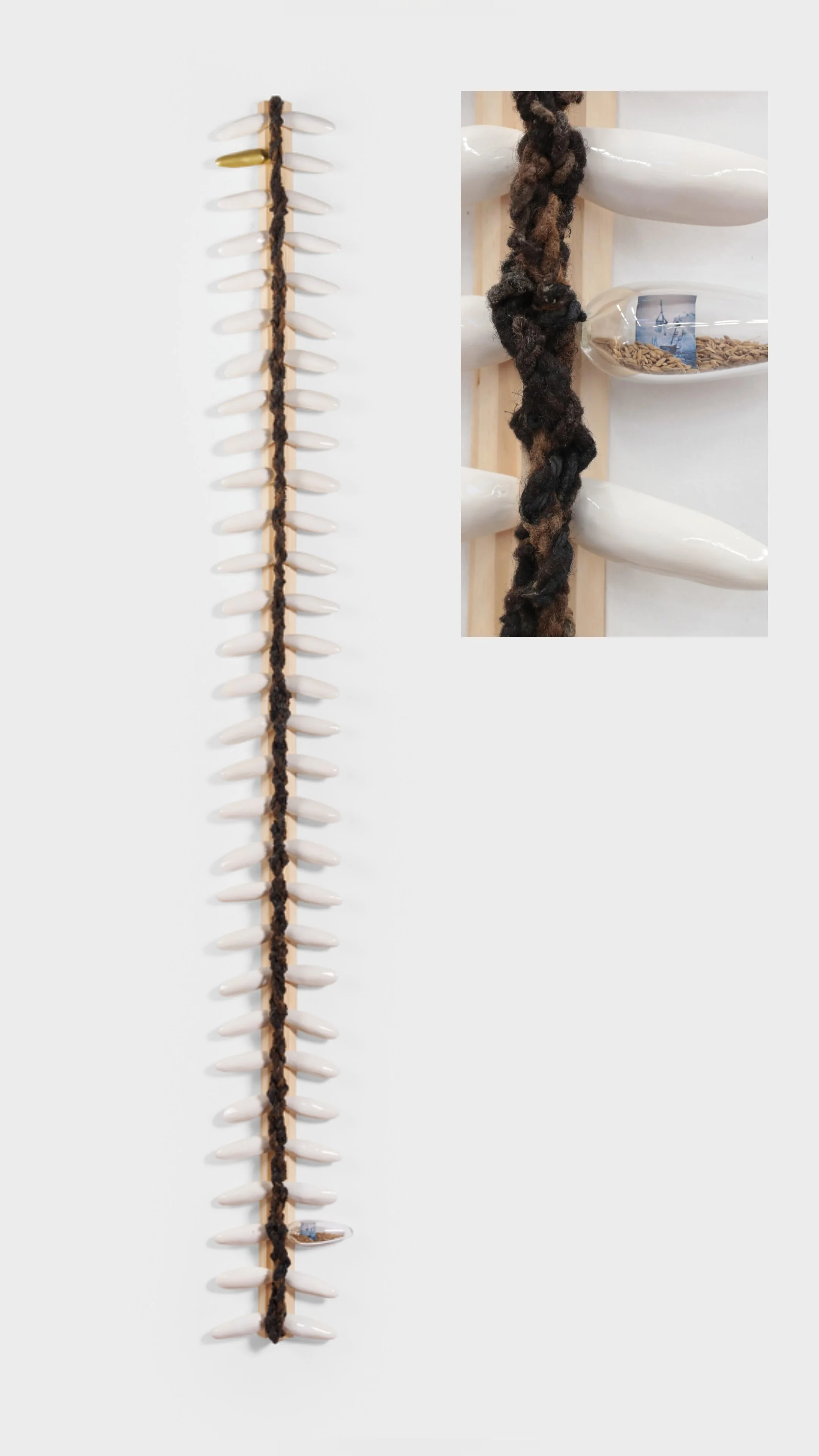Backbone; 2026.  Wood, Stoneware, hair, glass, photo transfer, rice, and paint. 
99" x 68" x 24" x 17"
***Chris Gardner Photo courtesy of NXTHVN***
